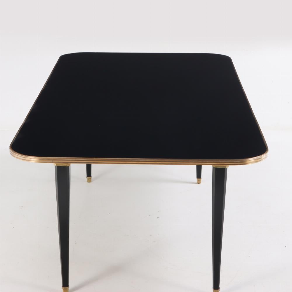 Ebonized mahogany and bronze mounted dining table, C 1940, attributed to Jansen In Good Condition For Sale In Philadelphia, PA