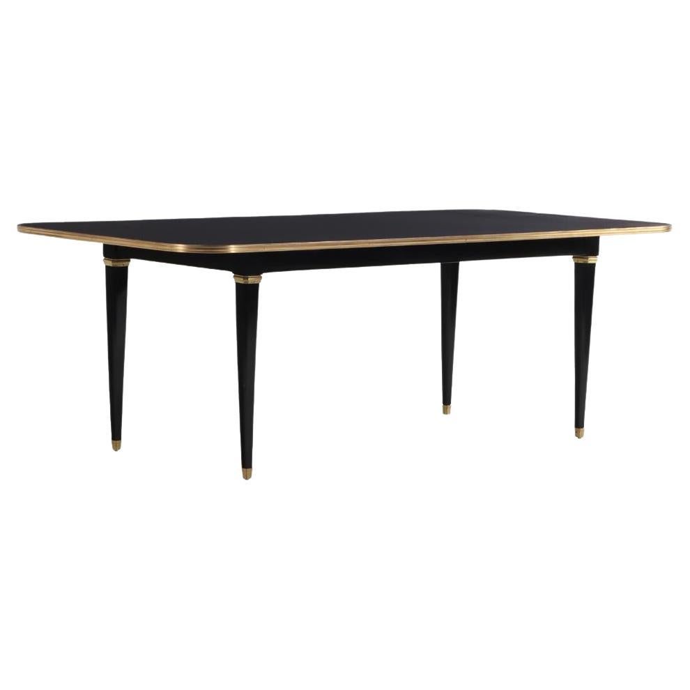 Ebonized mahogany and bronze mounted dining table, C 1940, attributed to Jansen