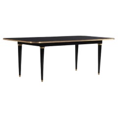 Table de salle à manger en acajou ébénisé et bronze, vers 1940, attribuée à Jansen