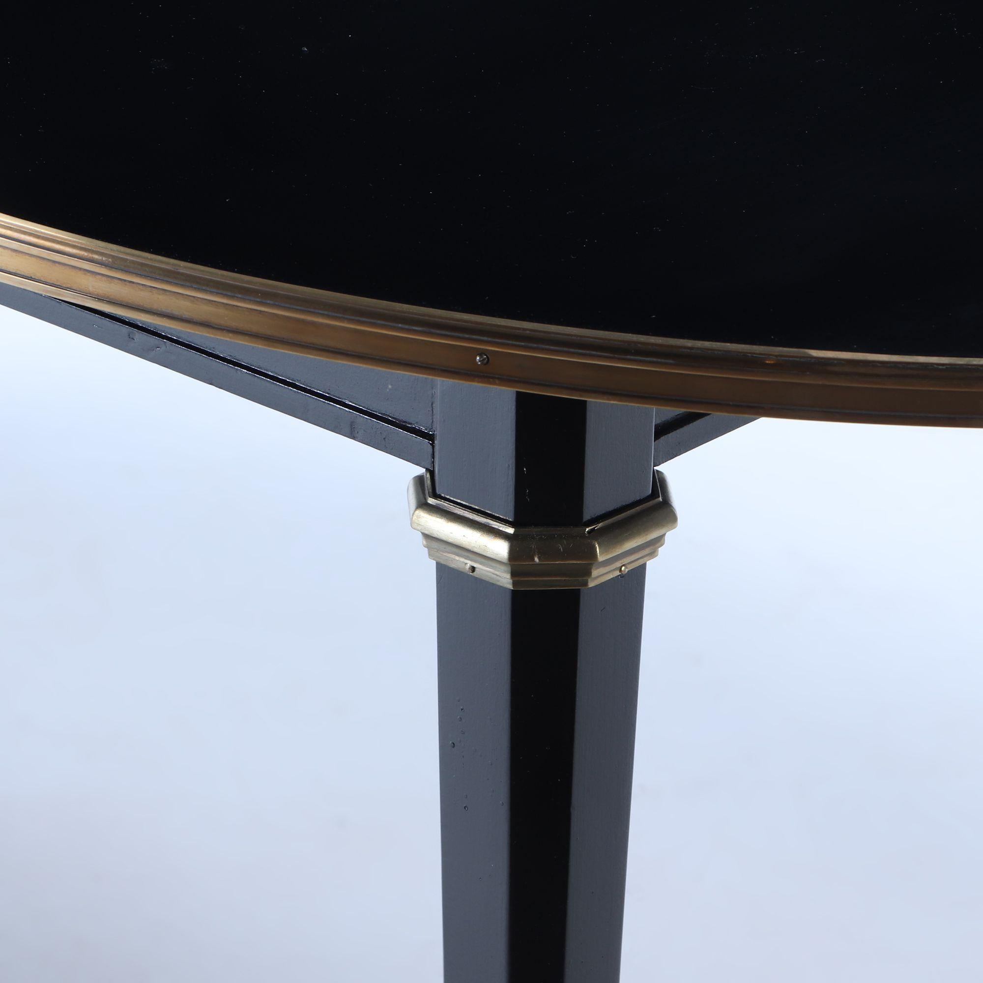 French Ebonized mahogany dining table attributed to Jansen having one leaf C 1940 For Sale