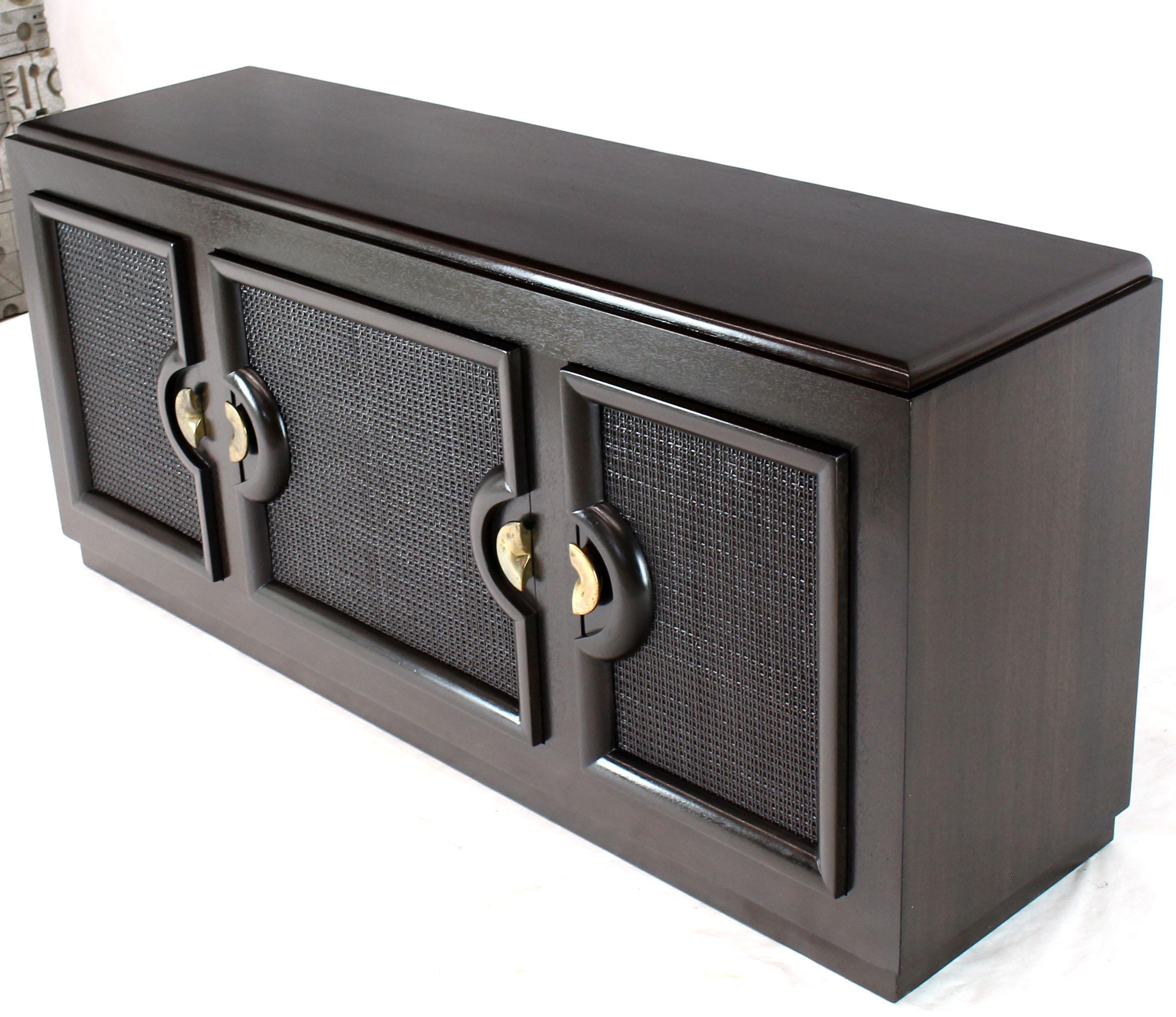 Mid-Century Modern Jame Mont Dunbar looking ebonized mahogany 3 compartments credenza dresser. One compartment has 4 smoothly sliding drawers. Nice satin finish.