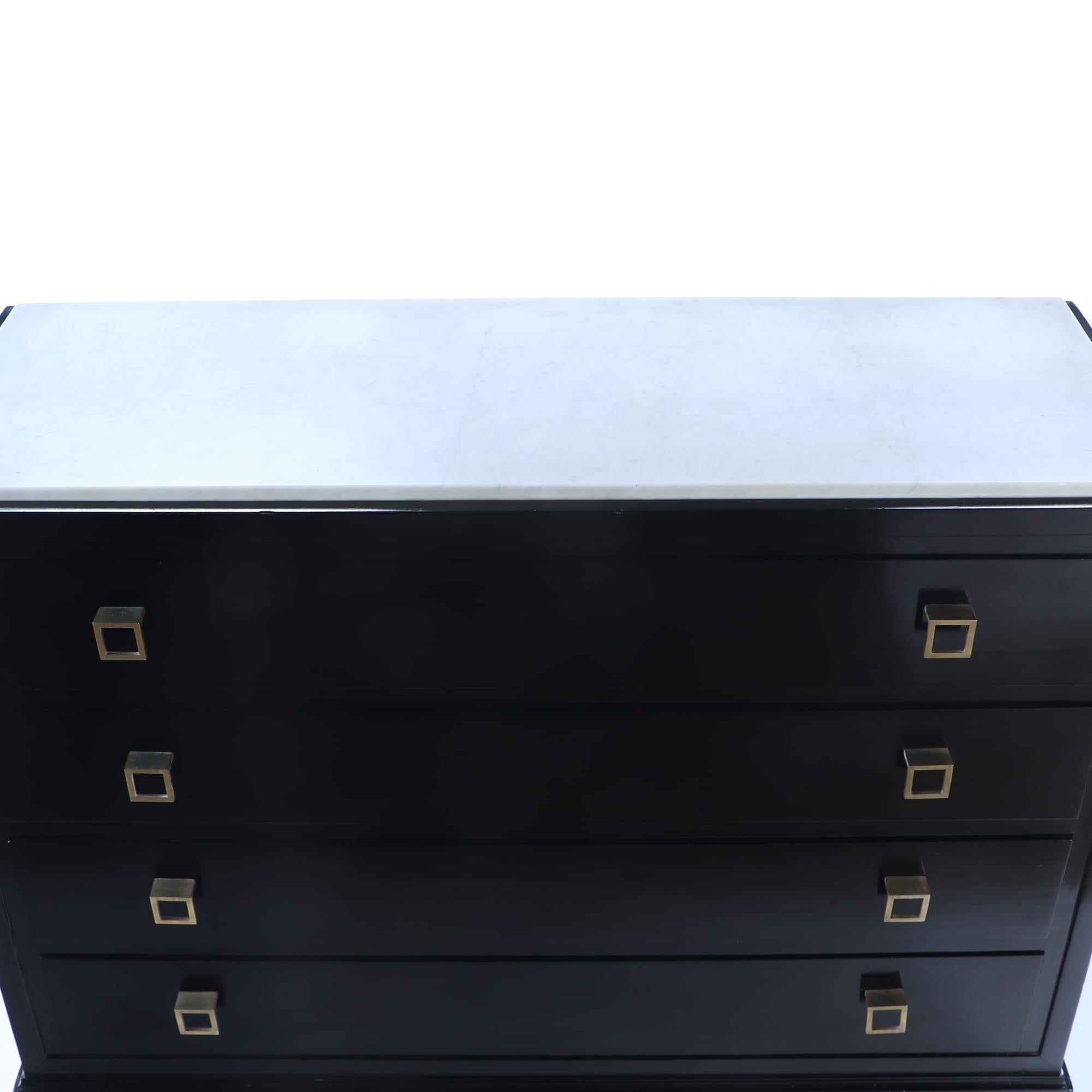 Mid-20th Century Ebonized marble top dresser having geometric brass drawer pulls C 1960. For Sale