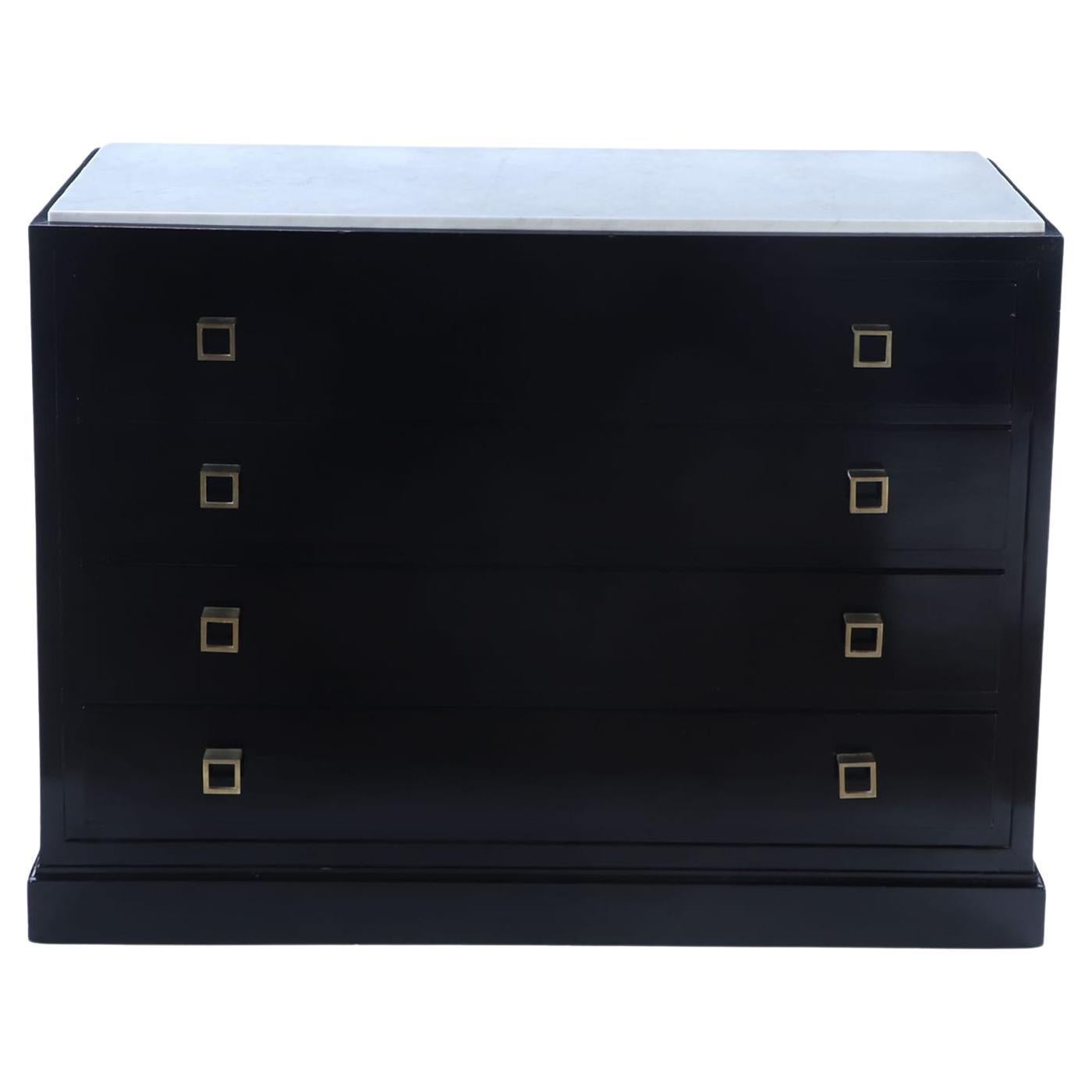 Ebonized marble top dresser having geometric brass drawer pulls C 1960.