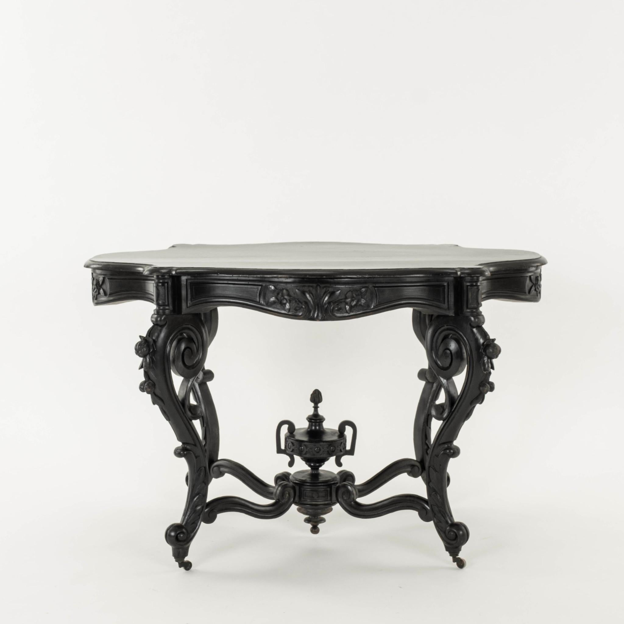 Period Napoleon III violin table. Elegantly carved, featuring, fruit, foliage and classical elements on casters.