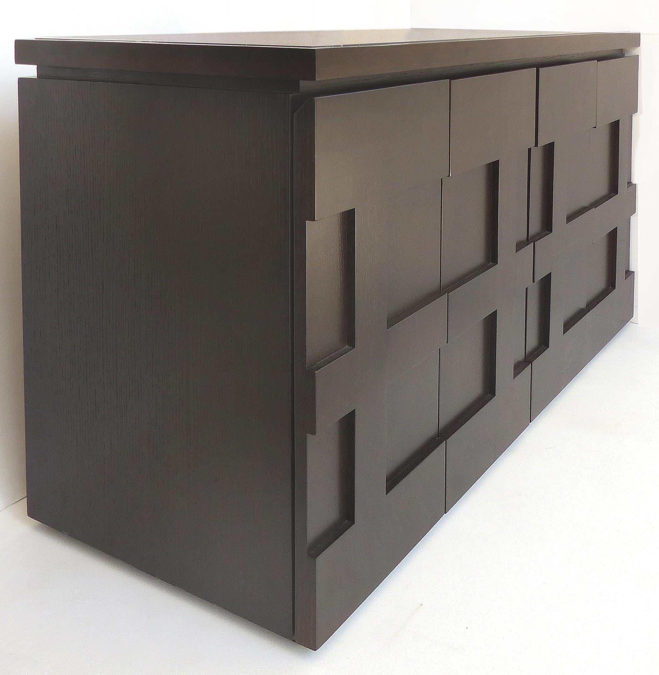 Raul Carrasco ebonized oak, marble top block front cabinets, pair.

Offered for sale is a pair of block front ebonized oak marble top cabinets by Raul Carrasco. These cabinets are a recent acquisition from a fifth avenue NYC estate. The block