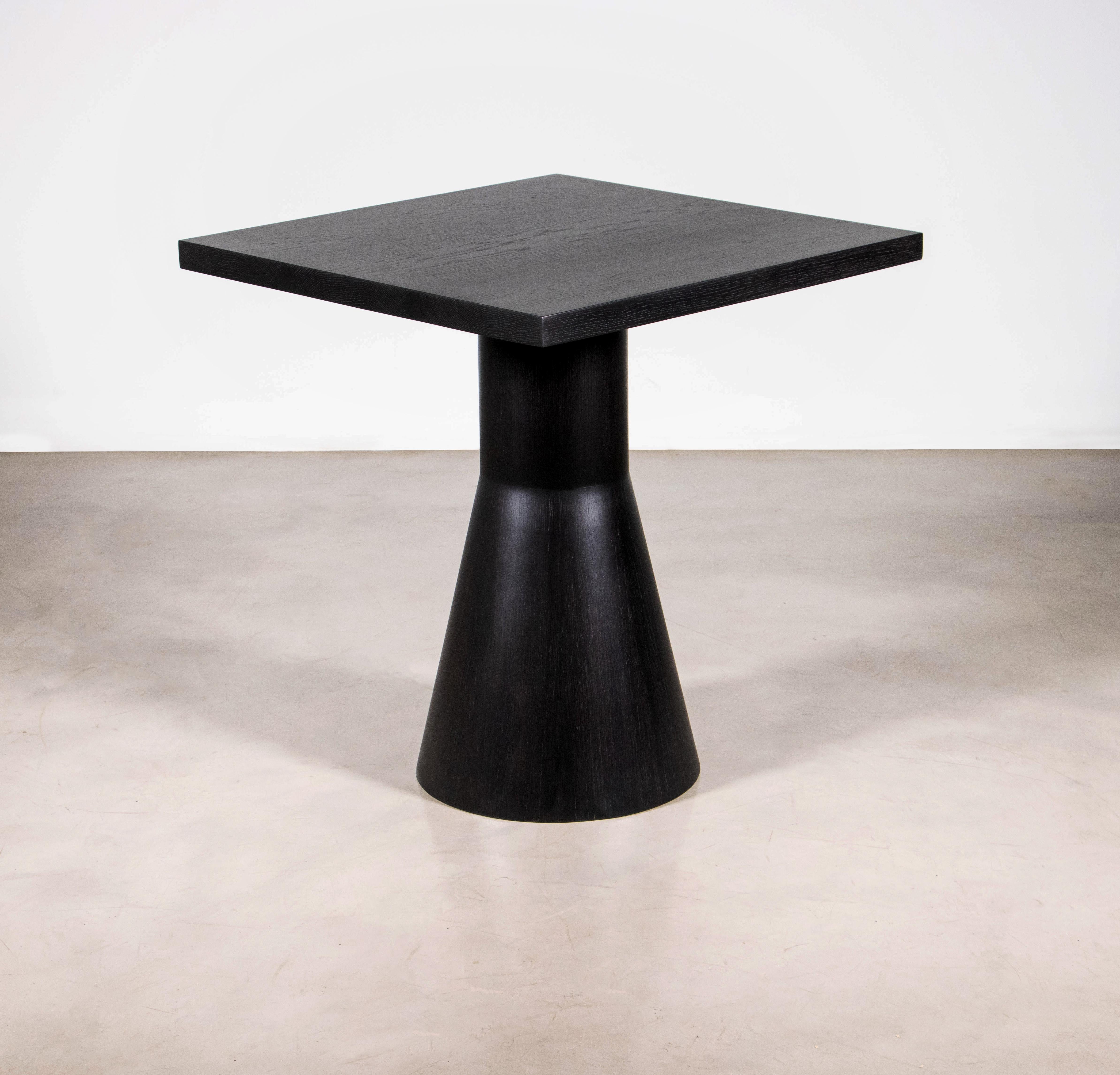 Serena is a Geometric Modern Ebonized Oak Square Dining Table By Costantini Design 

This table is made to order and available as shown or in the size, shape, material and finish of your choice. 

Measurements are 27.5