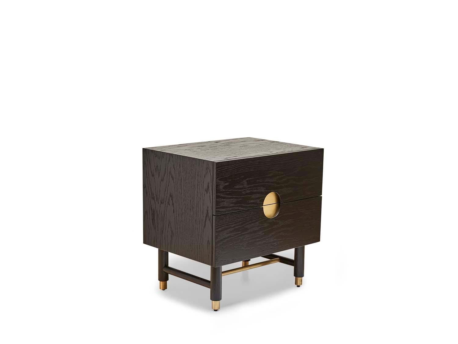 The Niguel Nightstand features two drawers. Details include leveling brass cap feet, a brass stretcher on the base, lacquered interior and inset brass hardware. Shown here in ebonized oak.

The Lawson-Fenning Collection is designed and handmade in