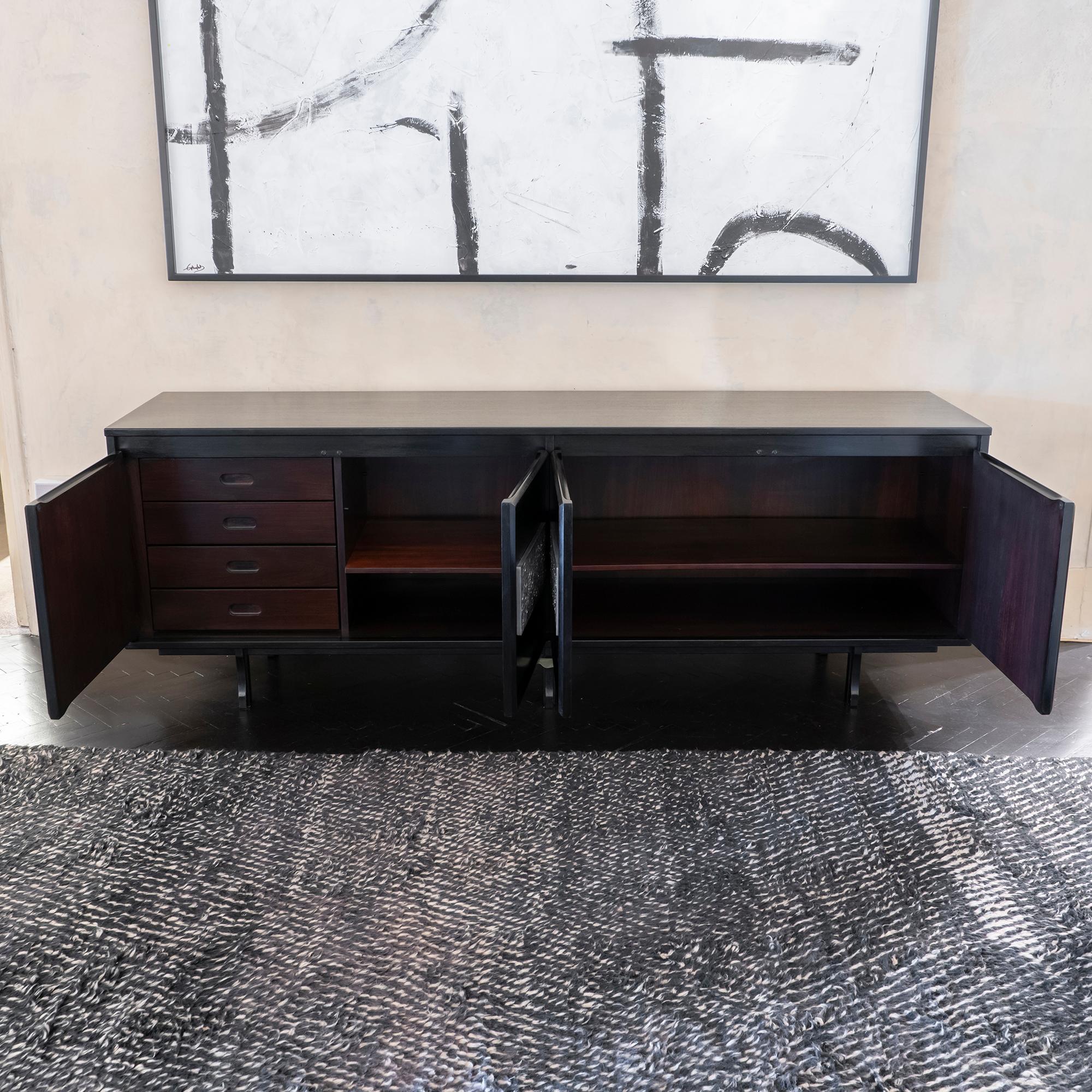 Ebonized palisander sideboard with four drawers and adjustable shelves, hammered metal decorative elements, Giovanni Ausenda, Italy, 1960s.