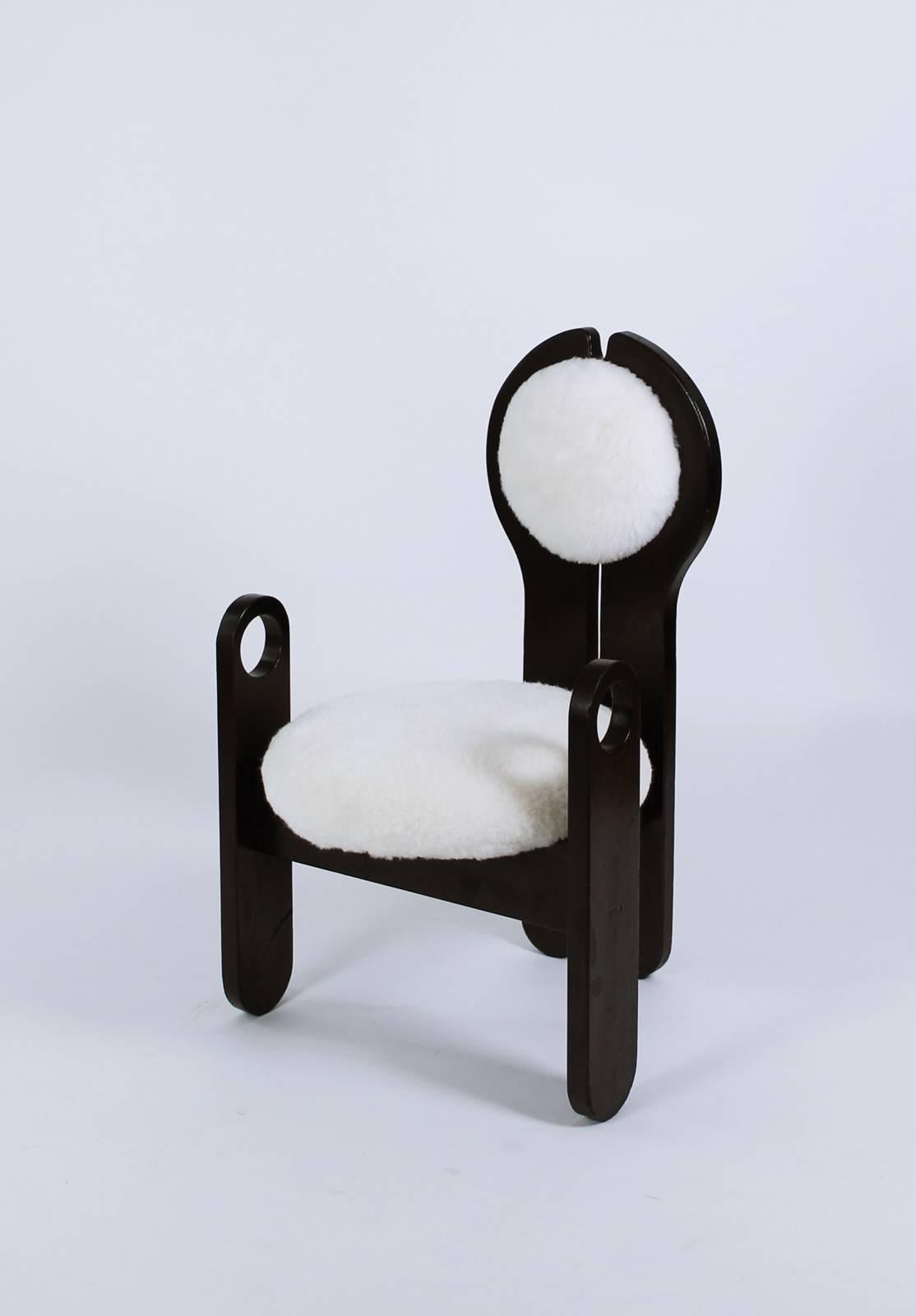 Unique and original form design piece from Hungary, 1980s. Very organic pistil-like shape with unique armrest. Seat and back upholstered in sheepskin
Overall, this rare chair has a great character.