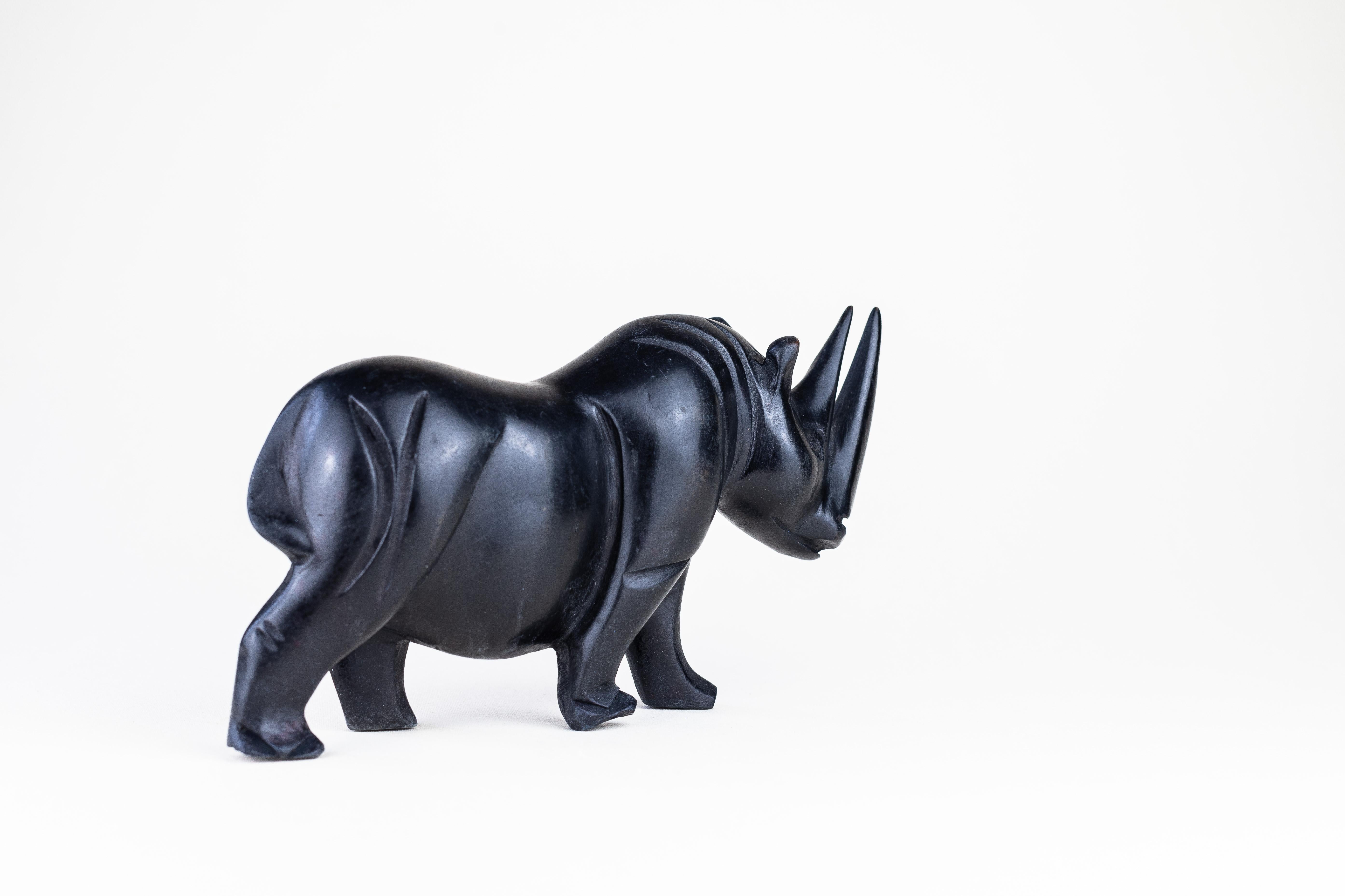 Blackened Ebonized Rhinoceros Wood sculpture For Sale