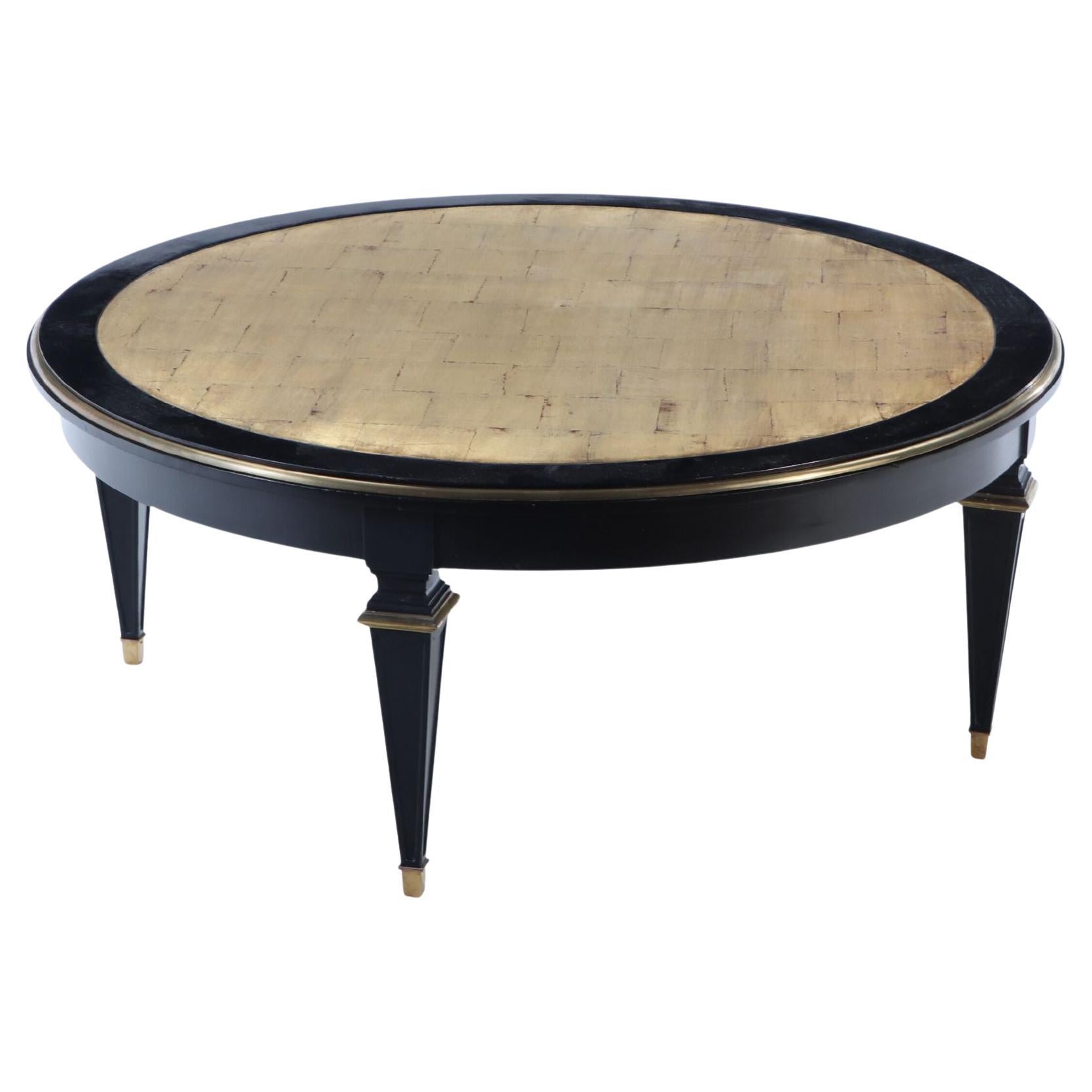 Ebonized round coffee table in the manner of Jansen circa 1940 For Sale