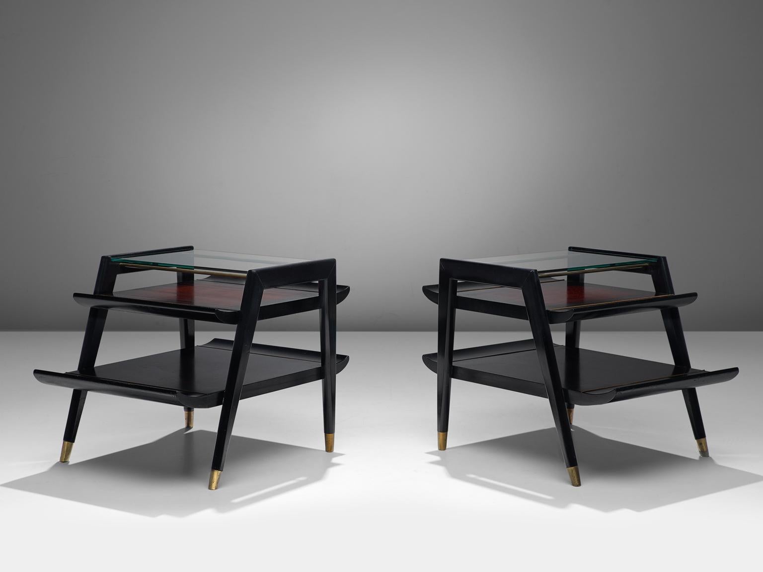 Gordon's fine Furniture, side tables, stained black wood and glass, 1960s, United States.

These ebonized side table are produced by Gordon's fine furniture in the 1960s in the United States and have characteristic curved shapes, that show strong