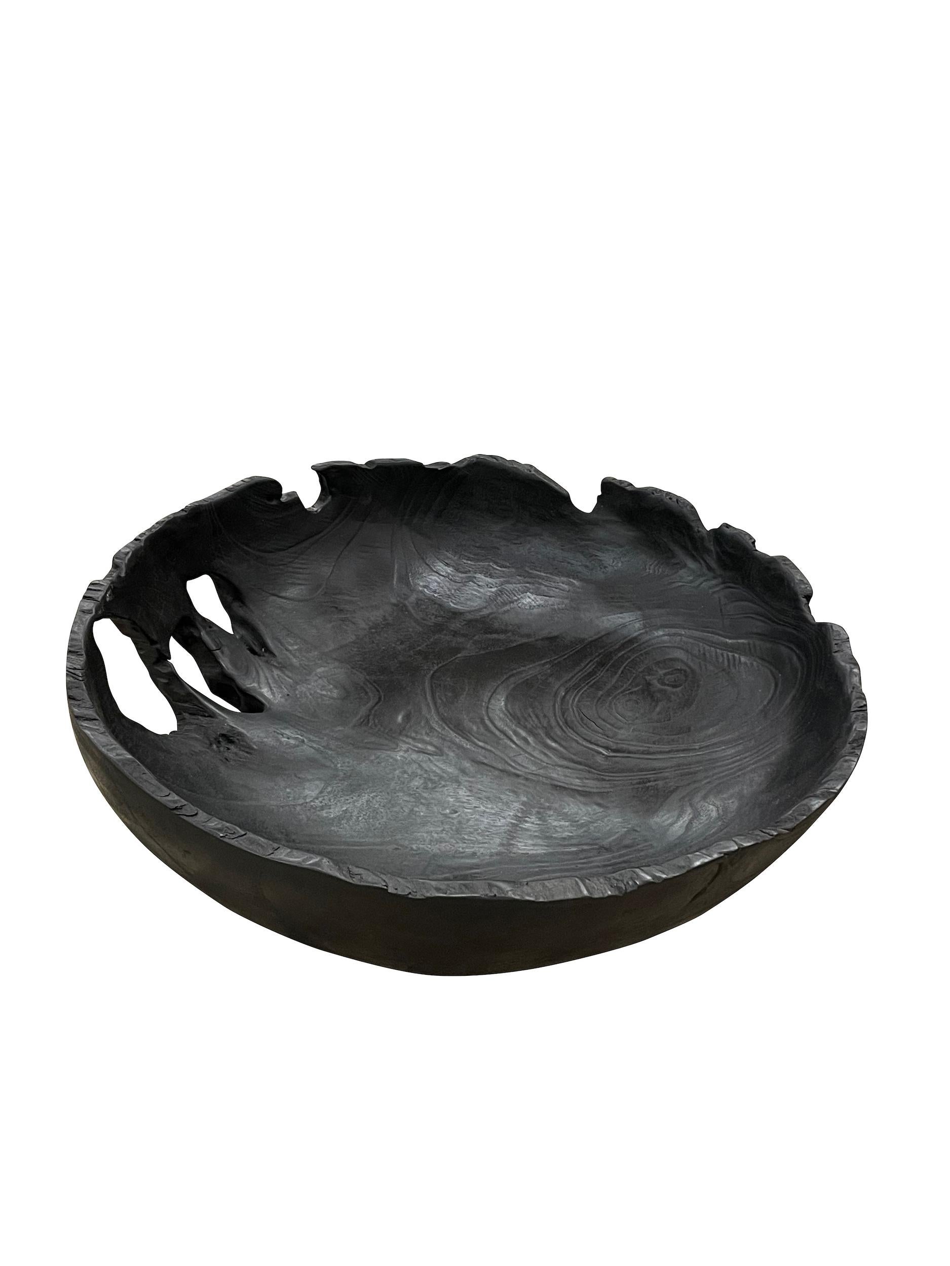 Contemporary Chinese ebonized teak organic shaped bowl.
