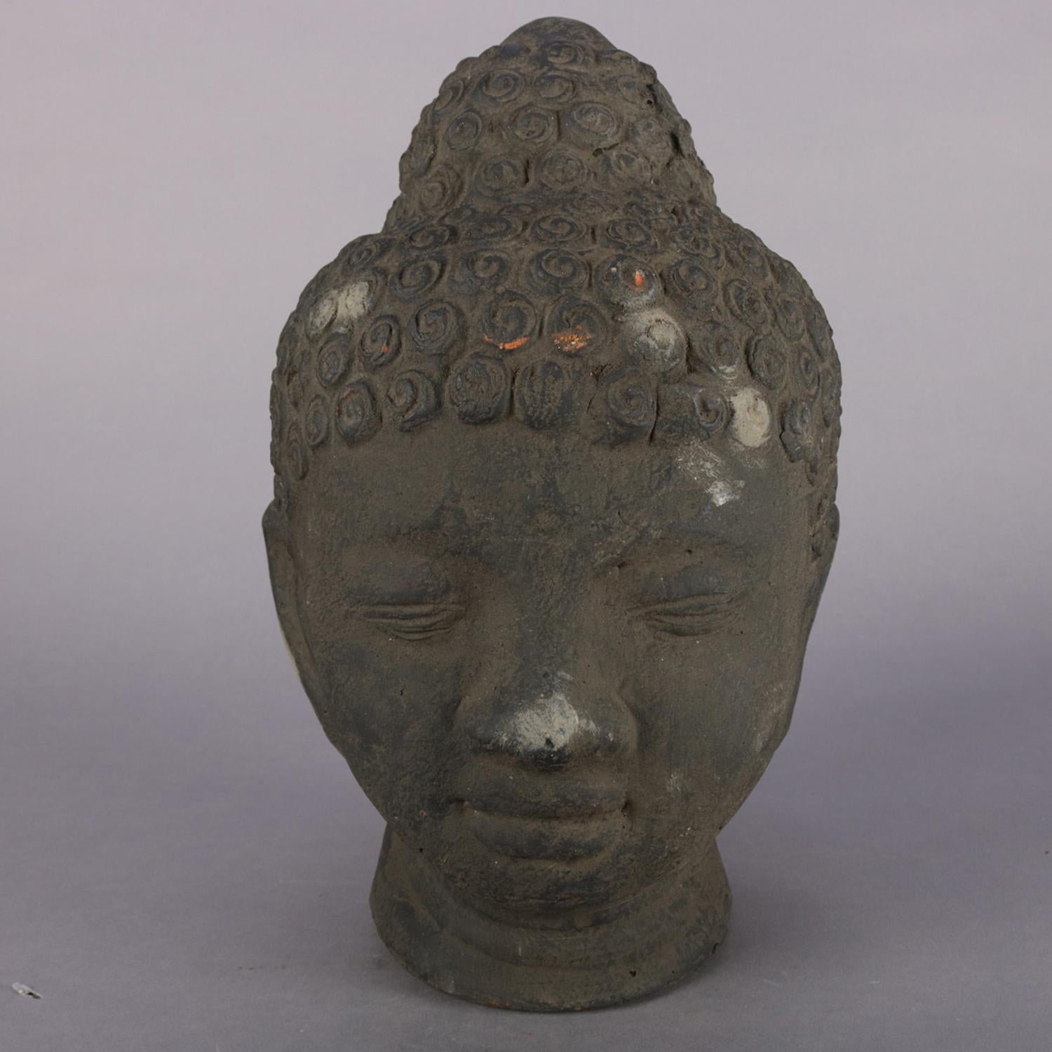 Ebonized terracotta head sculpture features meditating Shakyamuni Buddha, 20th century.

Measures: 13