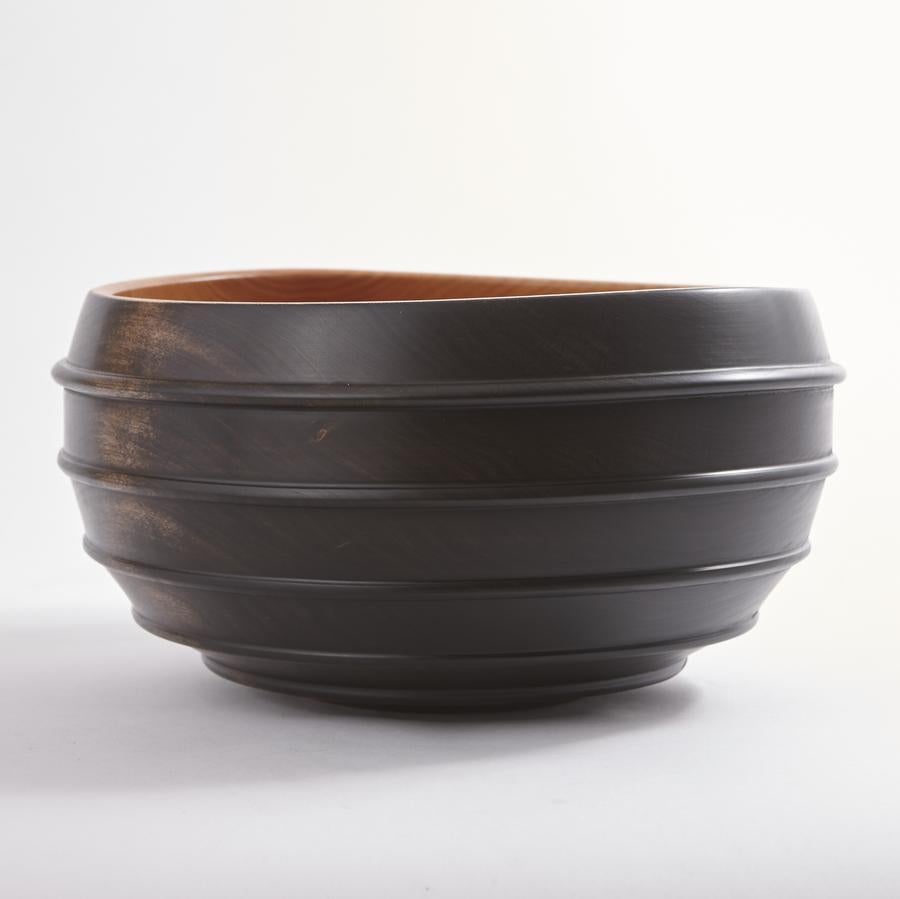 An exclusive series of beautifully turned and ebonized cherrywood bowls from Scott Alexander, of Alexander Designs. The bowls are turned from green (unseasoned) timber to finished thickness. As they dry they take on an organic shape all their own,