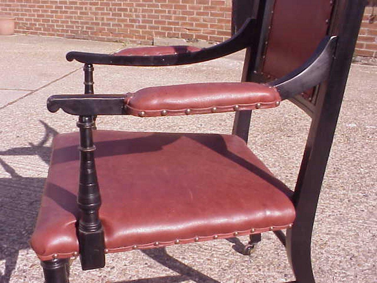 British Ebonized Upholstered Armchair Made by Oetzmann, After a Design by E.W. Godwin For Sale