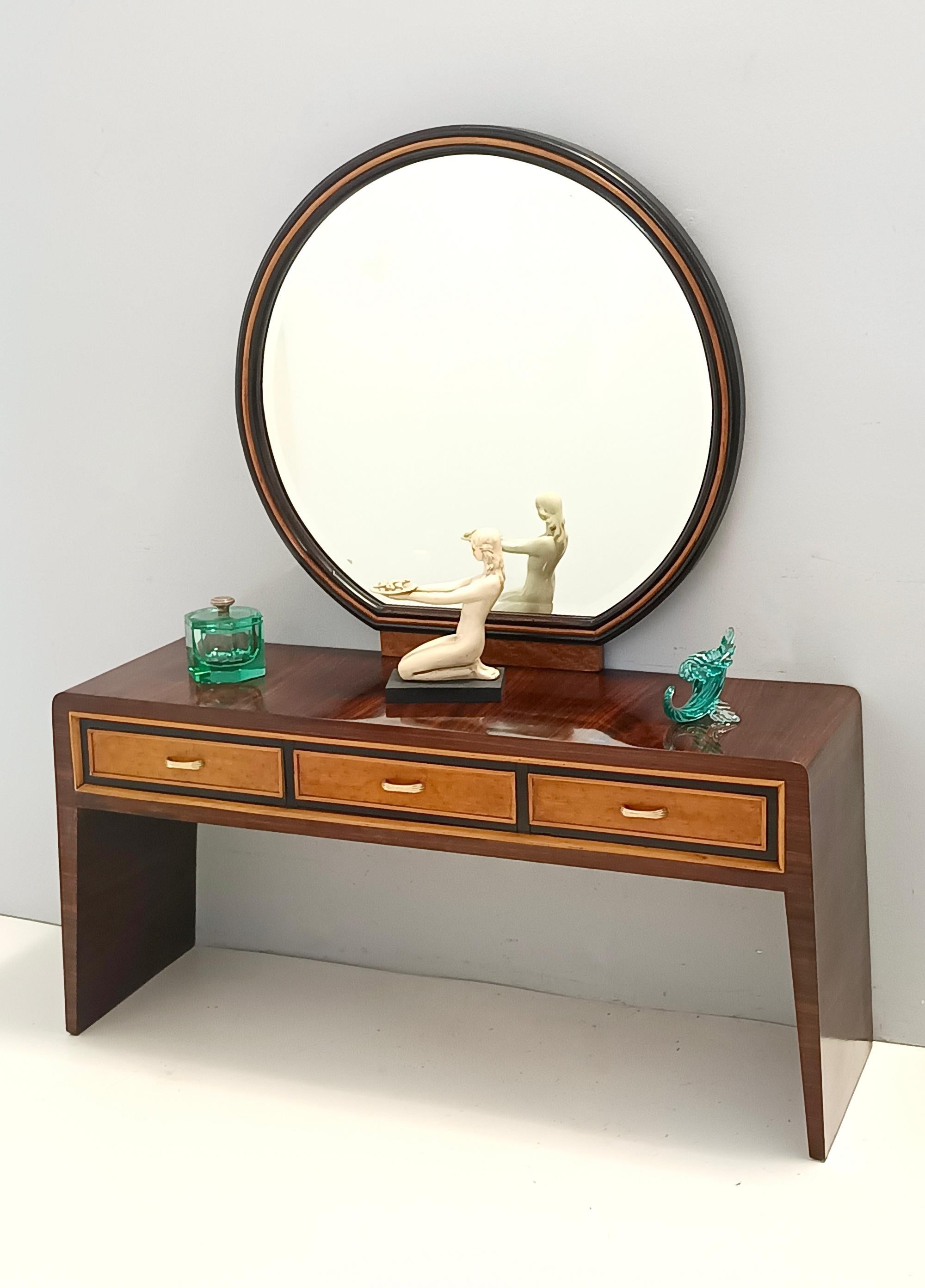 Made in Italy, 1950s. 
This console table / vanity table is made in ebonized walnut and birch. with brass handles. 
There is also the mirror, which is beveled.
It's been recently restored but it is a vintage piece, therefore it might show slight
