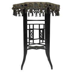 Antique Aesthetic Movement ebonized side table with the original faded green baize top.