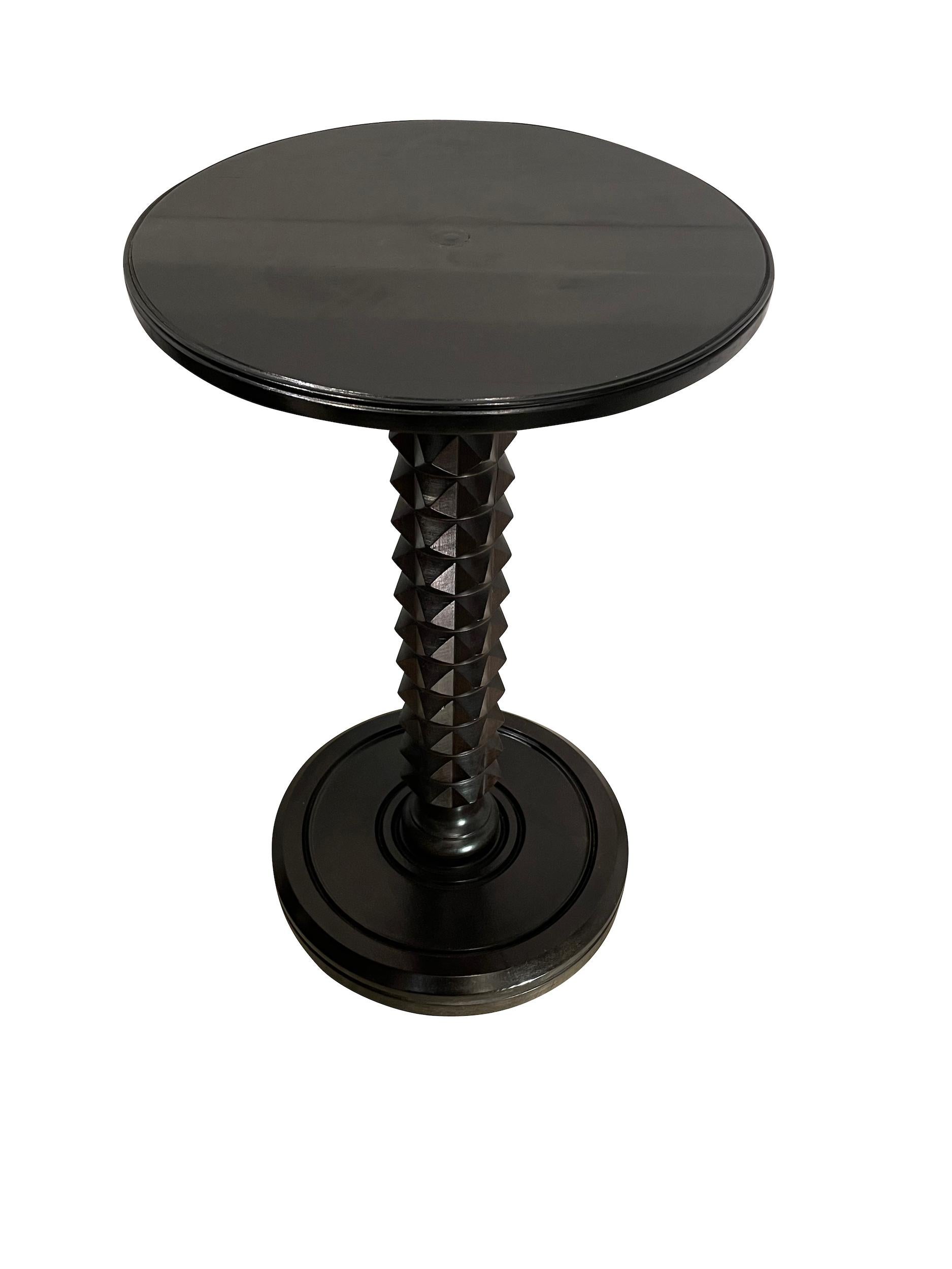 1940s French ebonized walnut side table in the style of Charles Dudouyt.
Classic carved pyramid shaped design pedestal.
