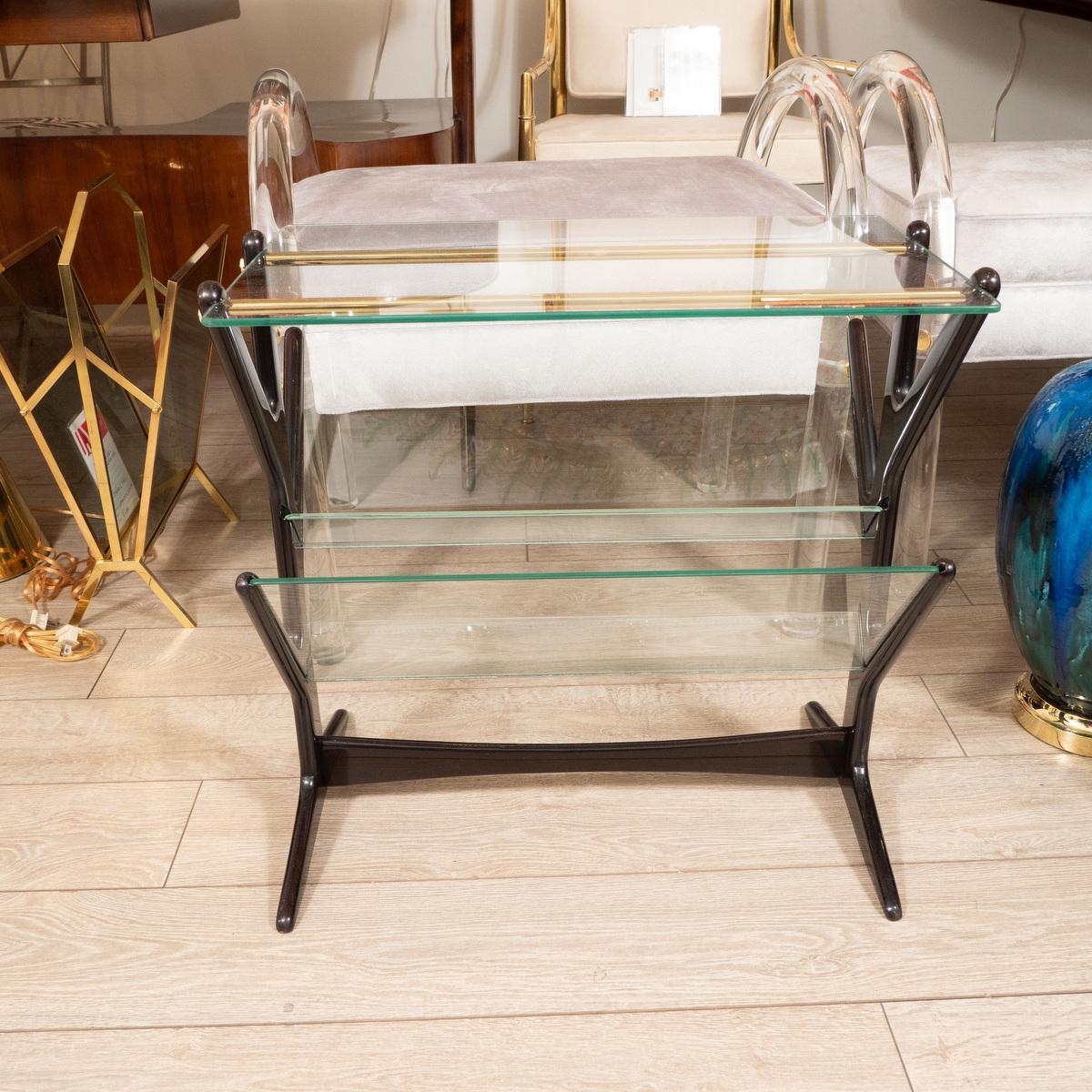 Mid-Century Modern Ebonized Wood and Glass Side Table / Magazine Rack For Sale