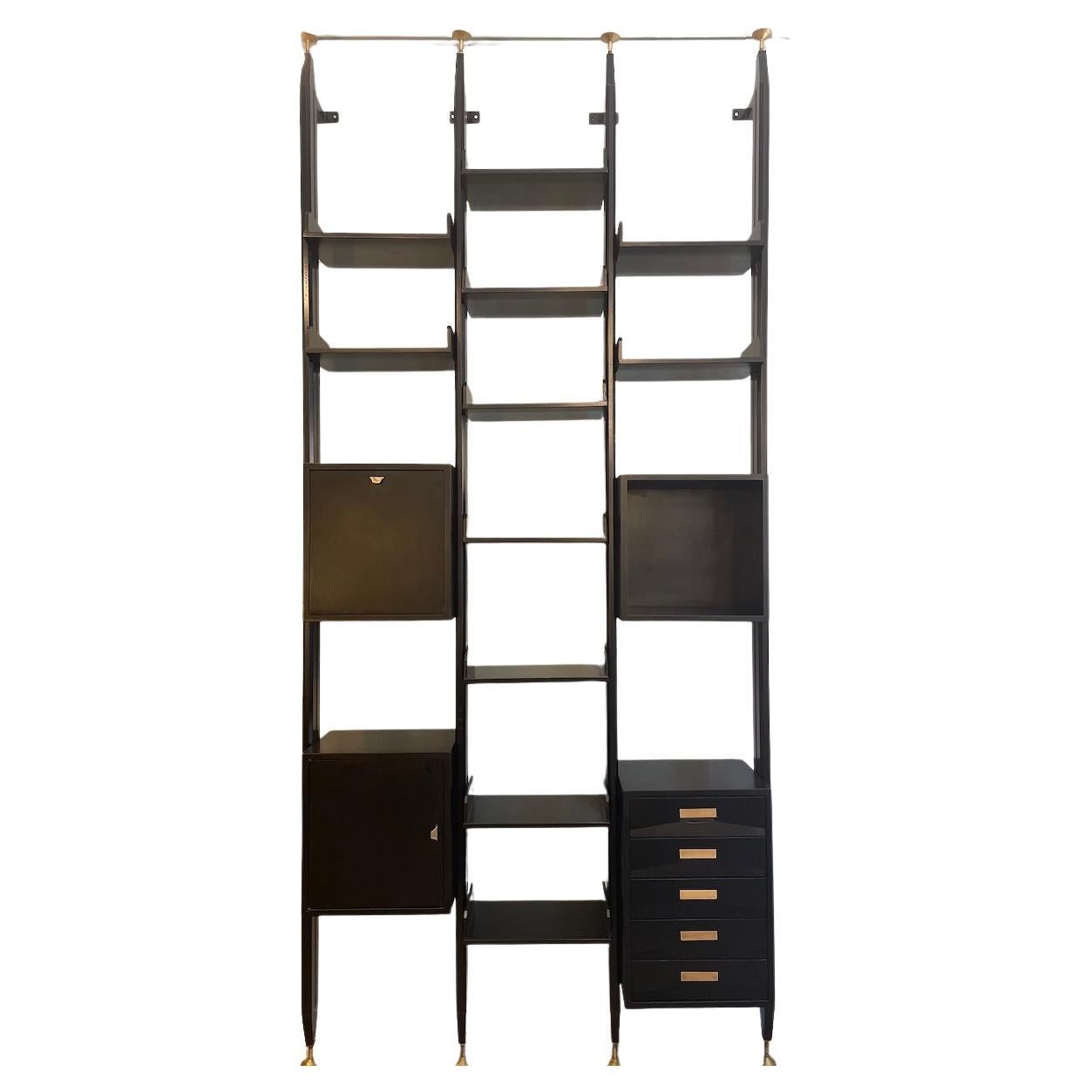 Ebonized wood bookcase in the style of Albini, 1960s For Sale