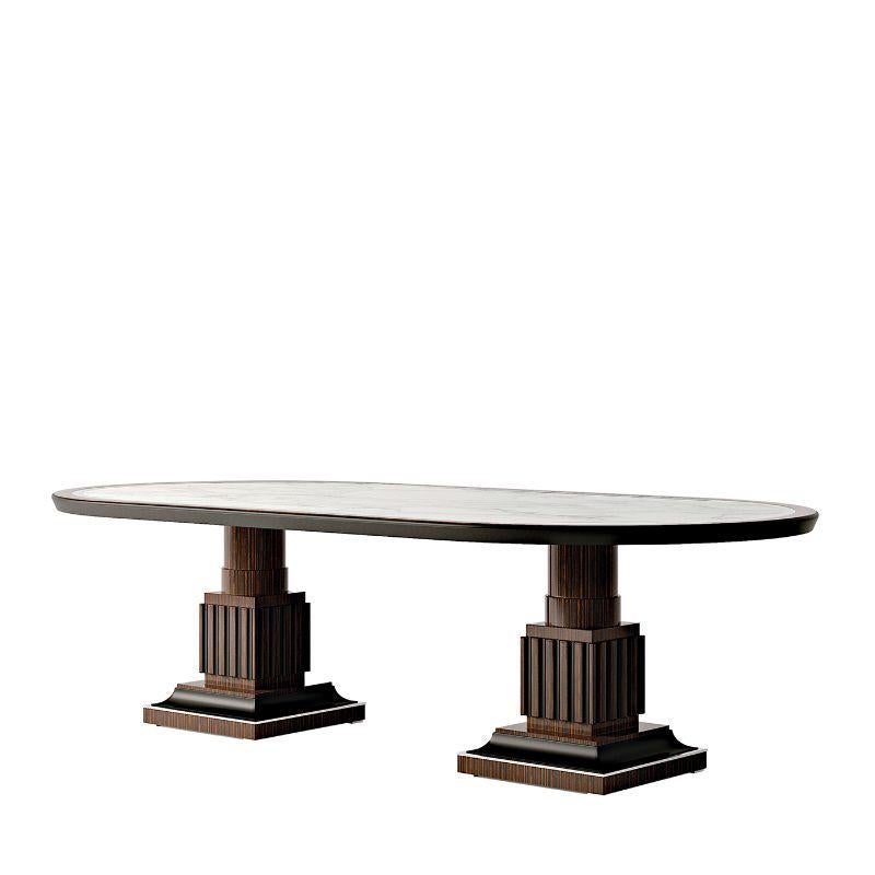 A precious furniture artwork deftly handcrafted of first-rate materials, this oval table will make a splendid addition to both modern and classic dining room decors. Deftly carved, the two legs are fashioned of ebony wood and support a fine white