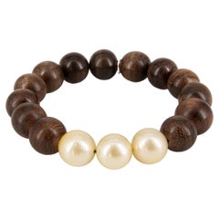 Ebony beads bracelet with 3 big Golden South Sea pearls