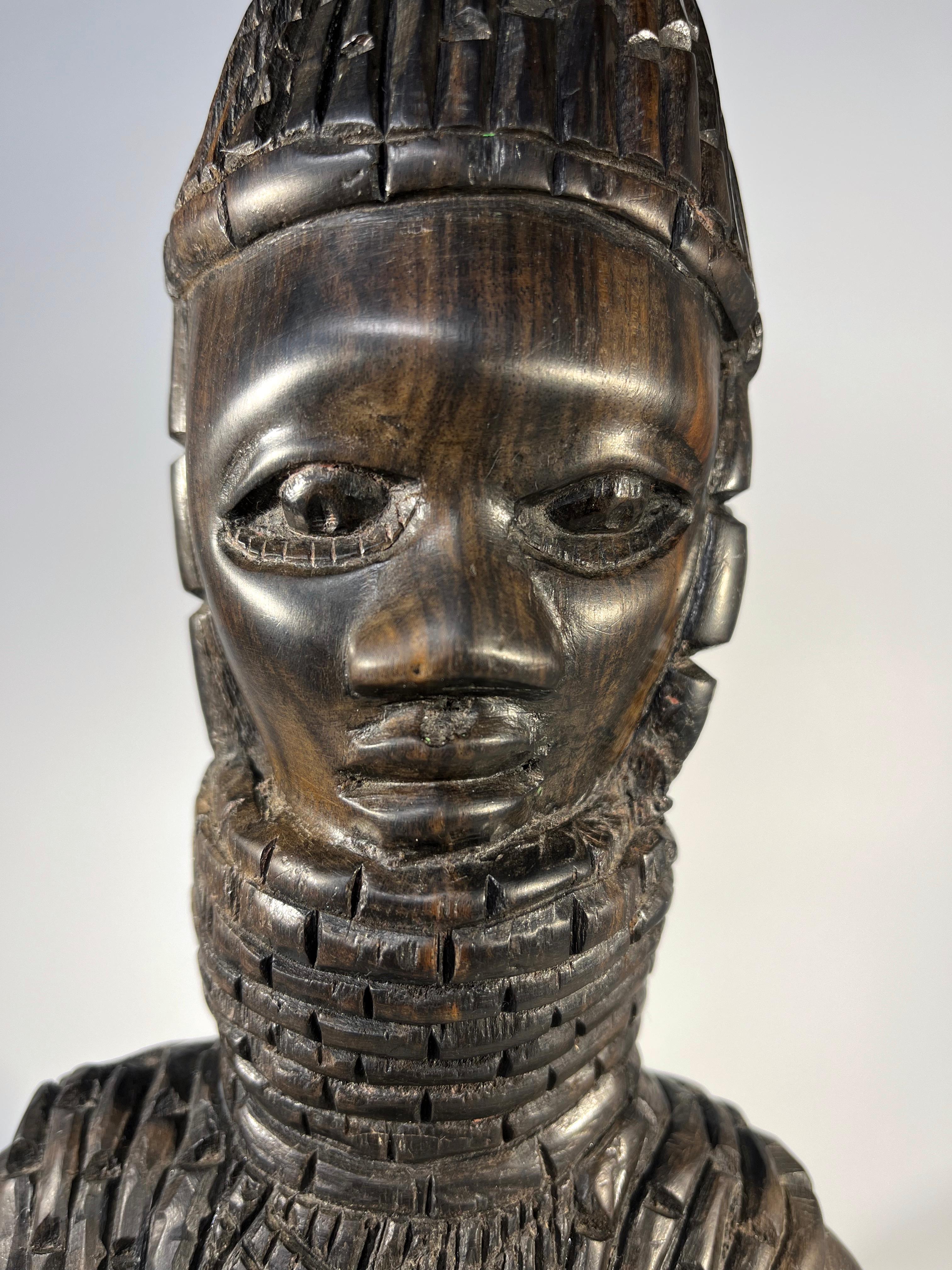 Hand-Carved Ebony Benin Kingdom, Bust Carving Of A Young Nigerian Warrior, 1970's For Sale