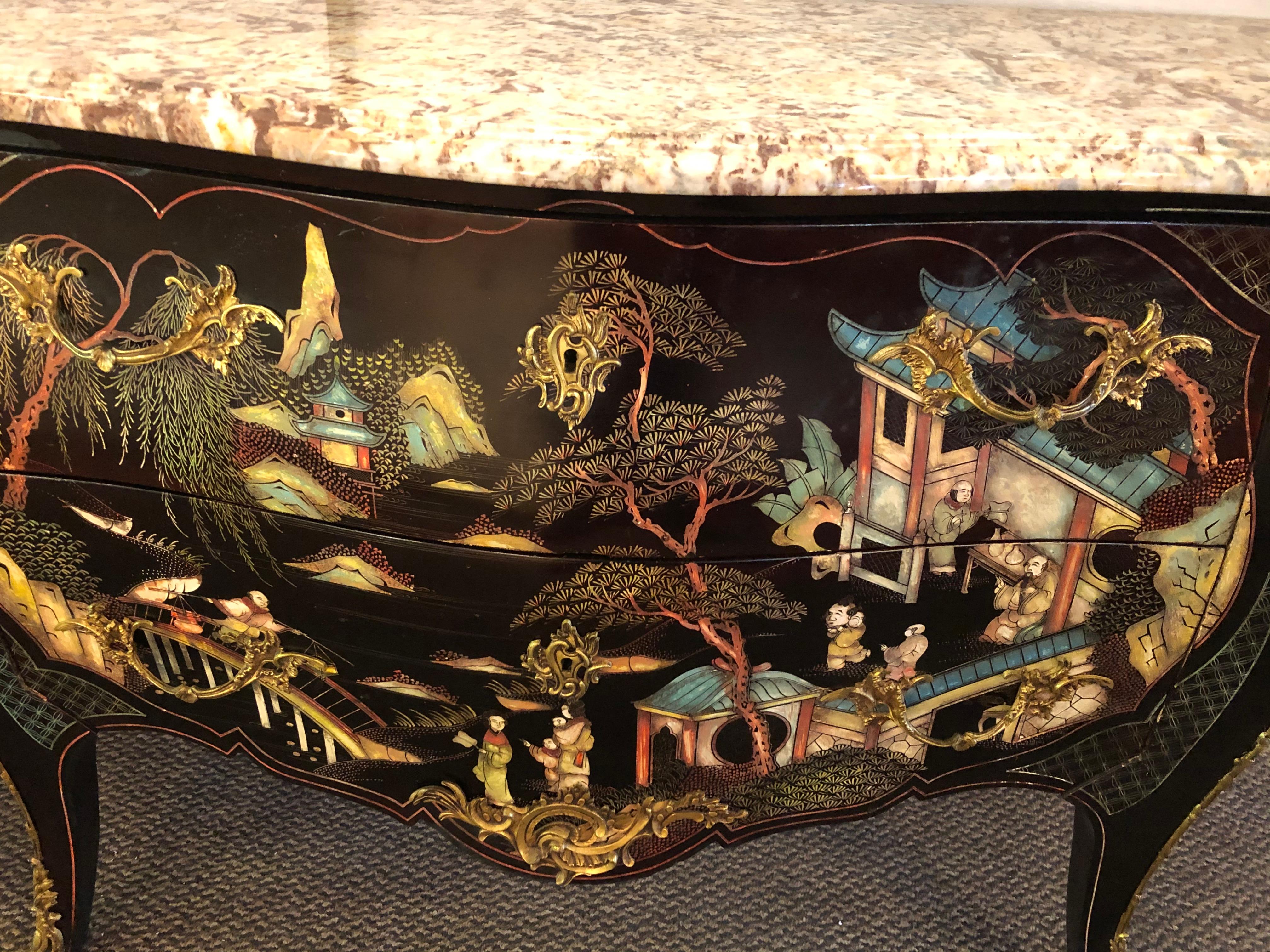 Ebony Bombe chests commodes chinoiserie Louis XV style marble top. A pair of simply stunning commodes or chest of drawers, night tables in the chinoiserie fashion. Early 1920s with finely marble tops. This fine pair of custom quality cabinets sport