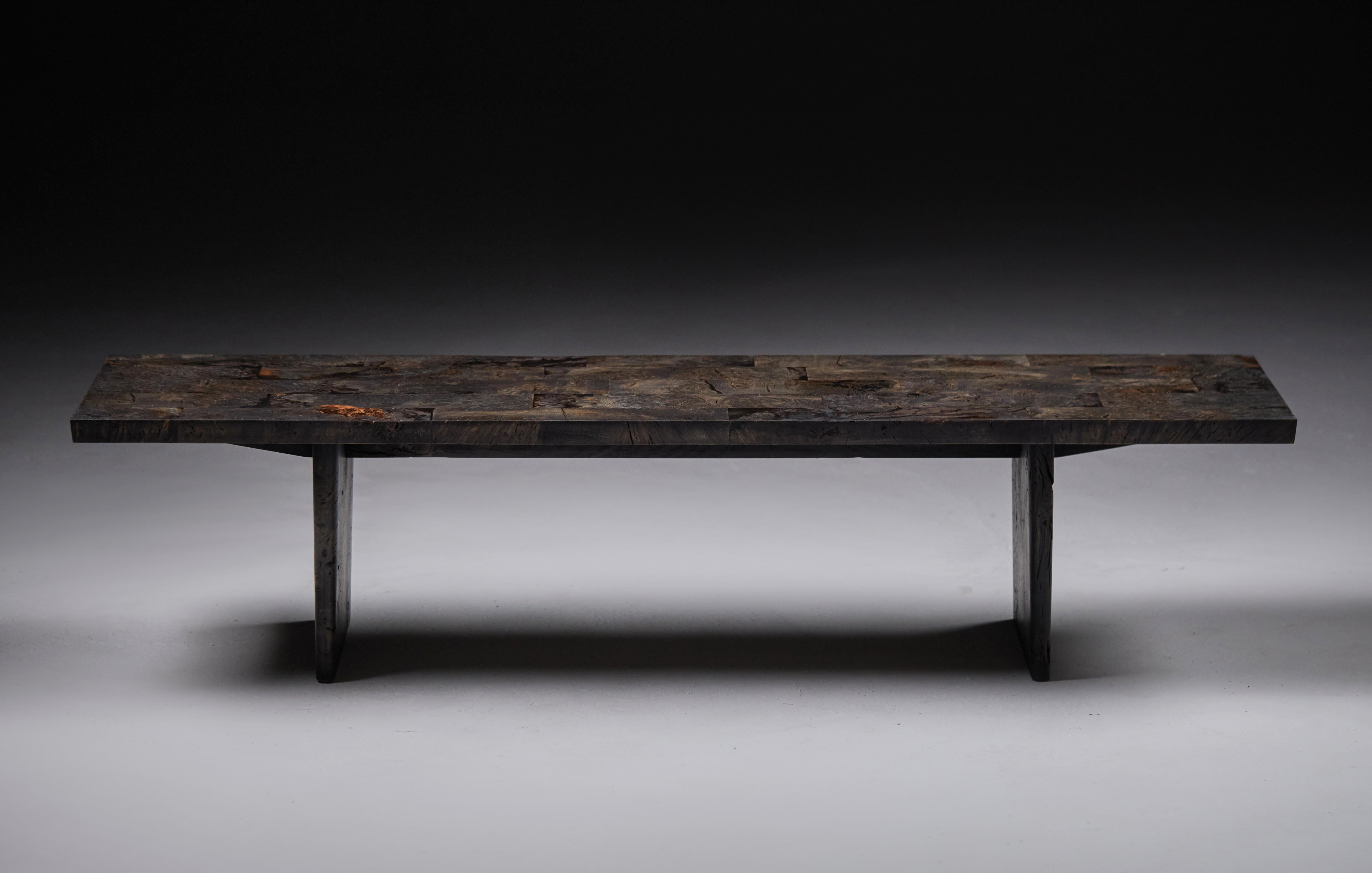 Low Burr Oak Bench or Coffee Table. 

Matching in size, they are made from the same solid burr oak with clear resin infill.
The first bench is finished with an ebonized oak and oil finish.

The second bench is finished with a protective two-part