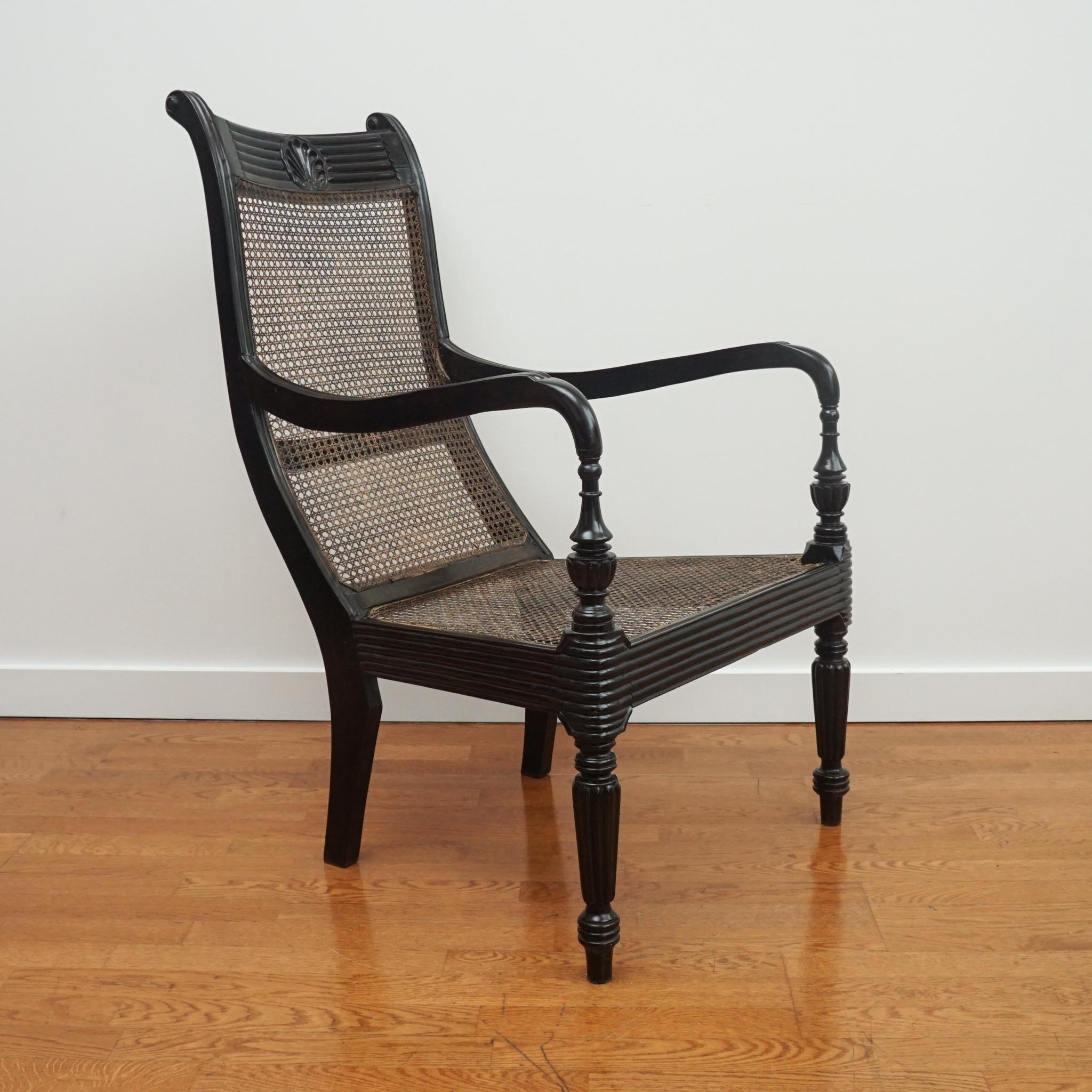 Anglo-Indian Ebony Carved Grandfather Shell Mark Chair For Sale