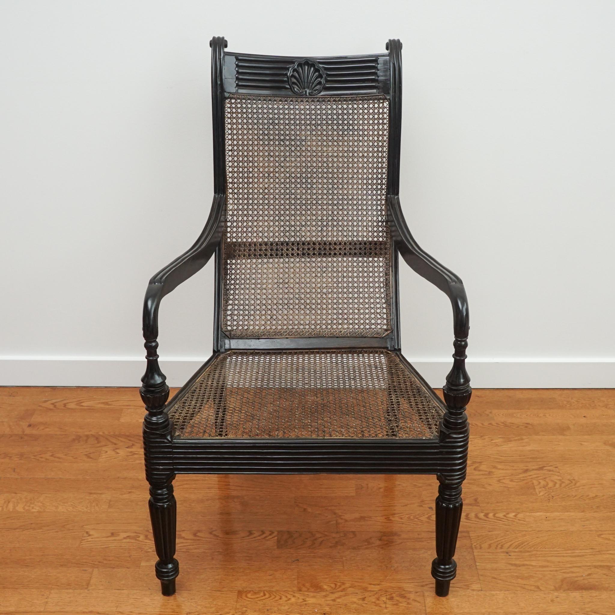 Sri Lankan Ebony Carved Grandfather Shell Mark Chair For Sale