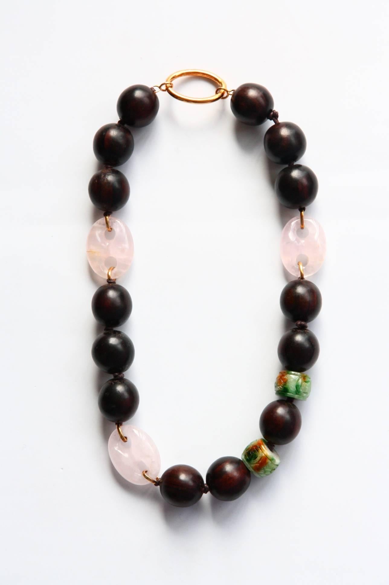 Natural ebony necklace with  rose quartz marine chain carved jade elements linked in gold 18kt gr 12,00.
Total length 58cm.
All Giulia Colussi jewelry is new and has never been previously owned or worn. Each item will arrive at your door beautifully