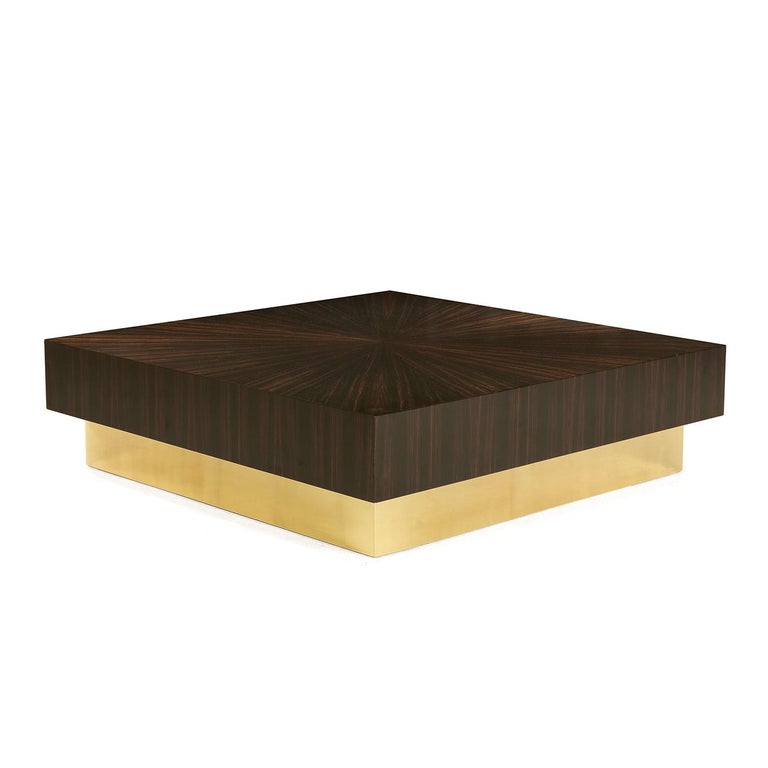 Part of a series of striking pieces of functional decor made of ebony and designed for a modern and contemporary home, this coffee table is a celebration of minimalism and luxury and will enrich the look of a living room with its subtle elegance.