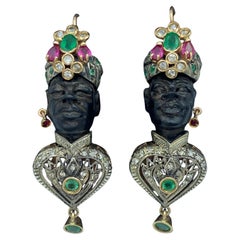 Boucles d'oreilles Moretto en ébène, diamant, émeraude et rubis