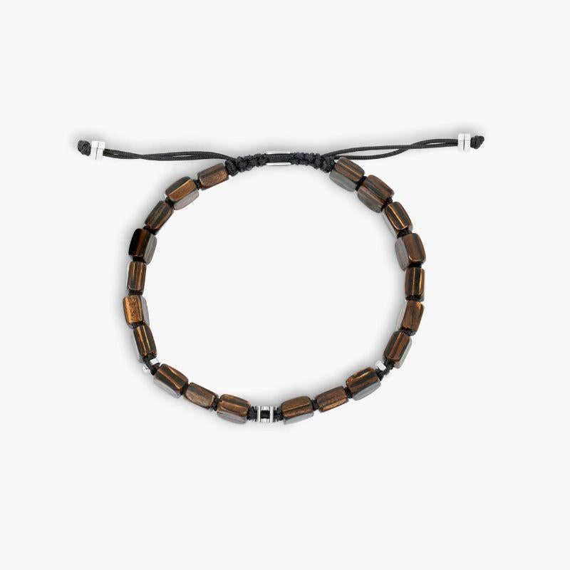 Ebony Gear Bracelet in Macrame with Rhodium Plated Silver, Size S

This square ebony wood beads add a fun twist to the macrame bracelet and features our gear bead component for added interest in the centre. Choose between black and burgundy macrame