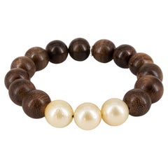 Bracelet ébène et perle dorée des mers du Sud de 12 mm de diamètre