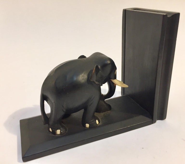 Ebony Hand Carved Wooden Elephant Bookends For Sale at 1stDibs