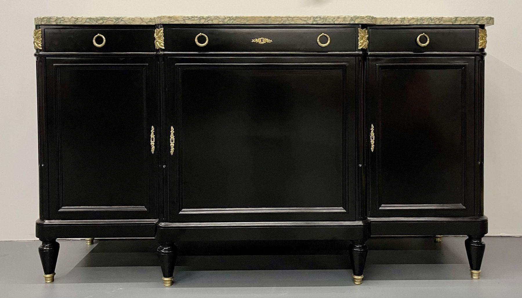 Hollywood Regency Style Commode, Chest, or Sideboard, Louis XVI, Bronze, French. 19th Century
Louis XVI commode fully refinished in a premium black satin finished with newly cleaned original exceptionally well cast Bronze mounts. This stunning