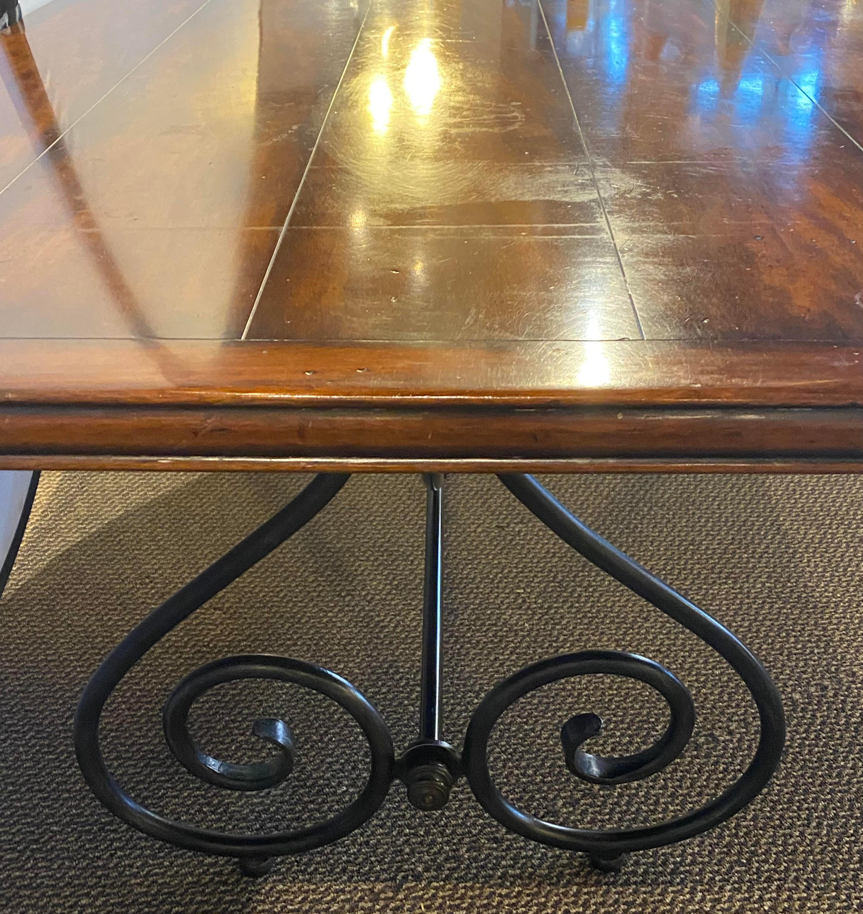 20th Century Ebony Metal and Brass Scroll Base Dining Table Wood Top Baroque Style For Sale