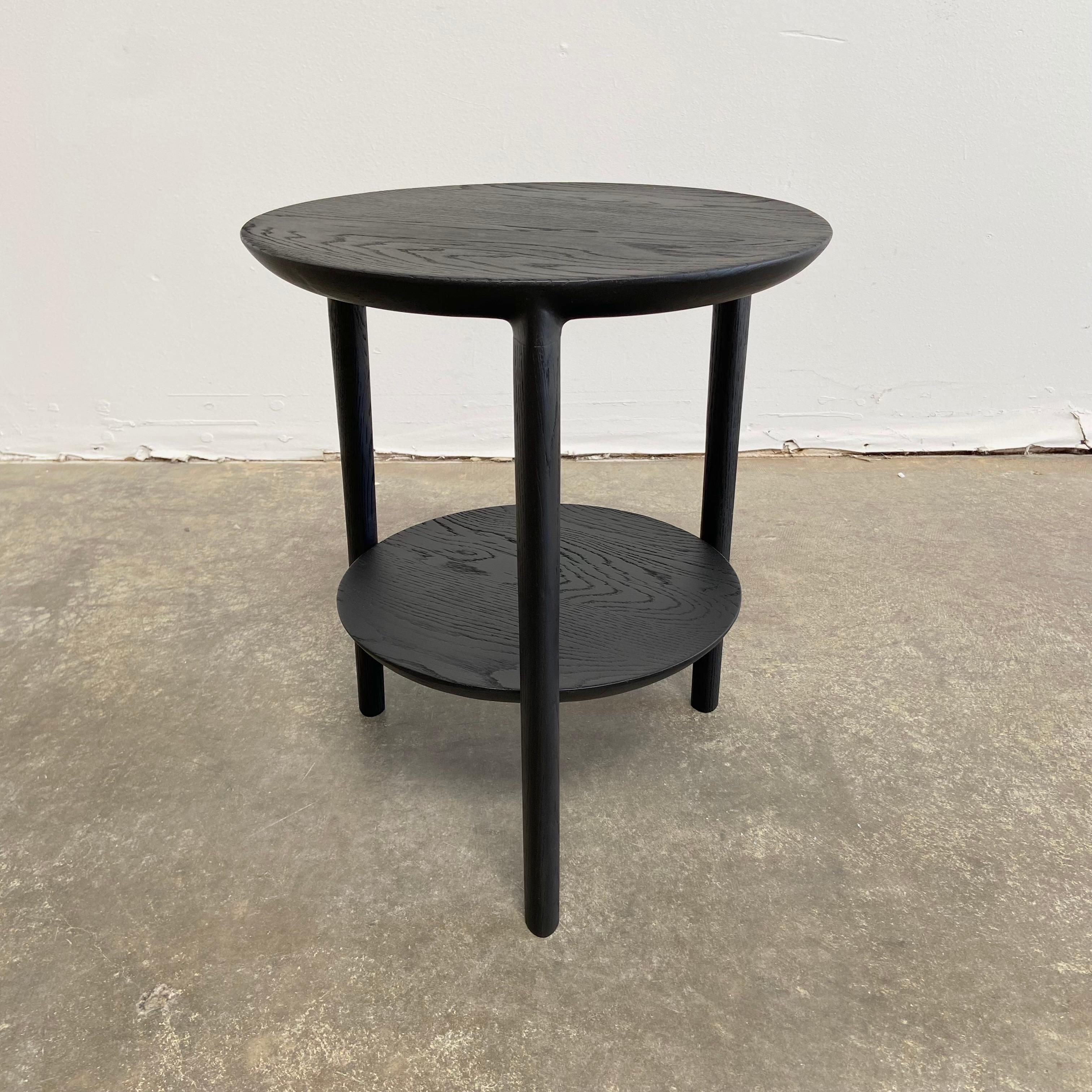 Oak black side table
The side table was designed to attract attention without diverting it from the items you choose to display on it. From art to books or plants, with the oak side table, your object of choice has found its stage.
Installed