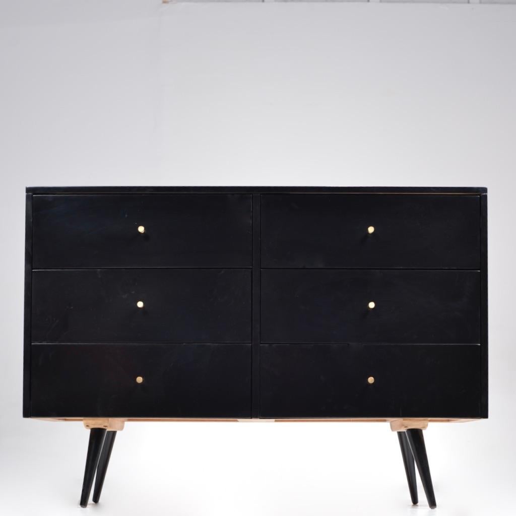 Beautiful six-drawer dresser designed by Paul McCobb for Winchendon Furniture Co.'s Planner Group, circa 1950s.
This dresser offers lots of storage with six drawers, featuring tapered legs, and brass pulls. 
It is in wonderful condition and is