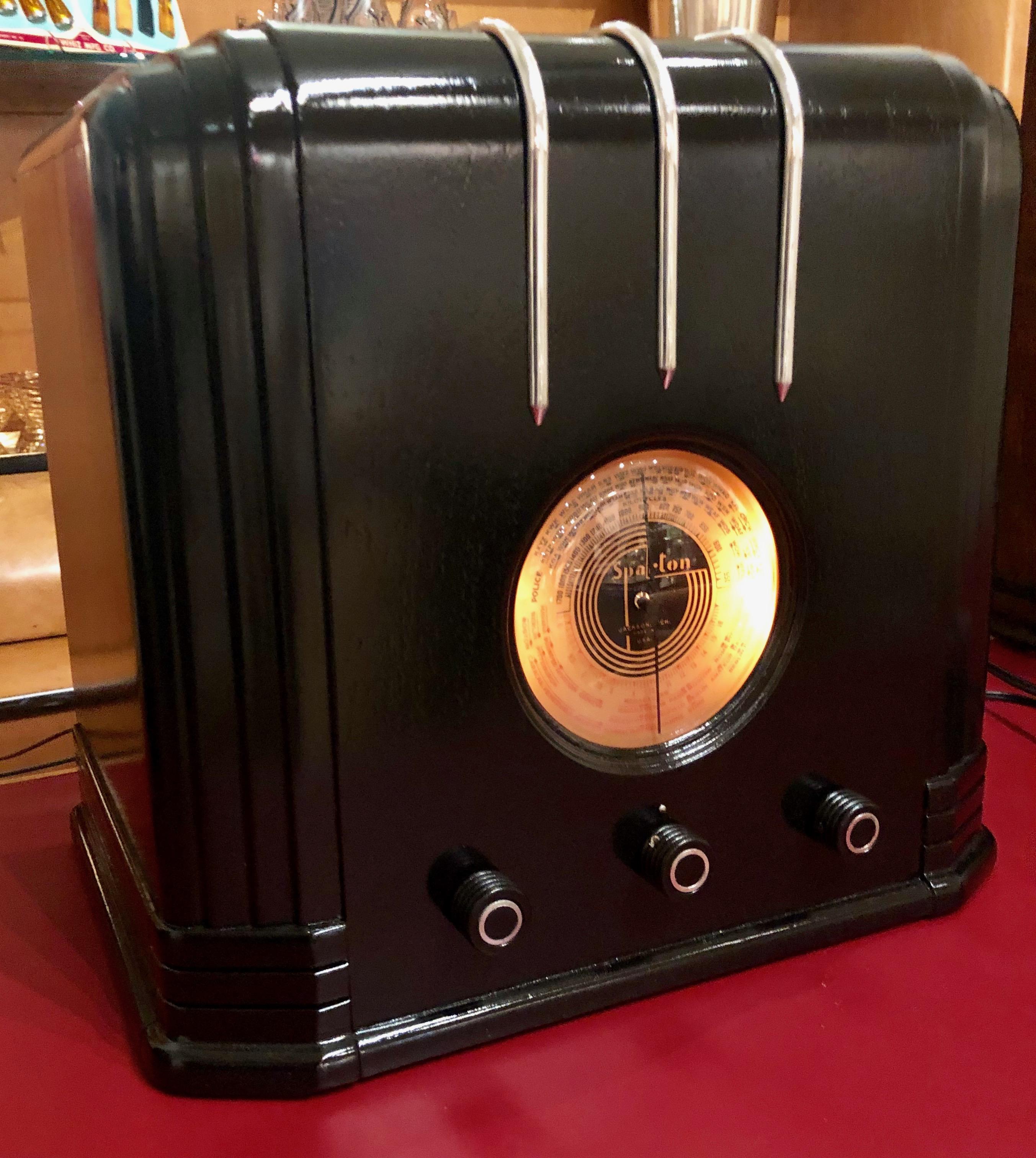 Rare 1936 517-B Sparton “Cube” with the ebony lacquer finish plus chrome trim, a rare Art Deco radio. Manufactured by the Sparks-Withington Company of Jackson, Michigan and was the creation of renowned Industrial designer Walter Dorwin Teague. This