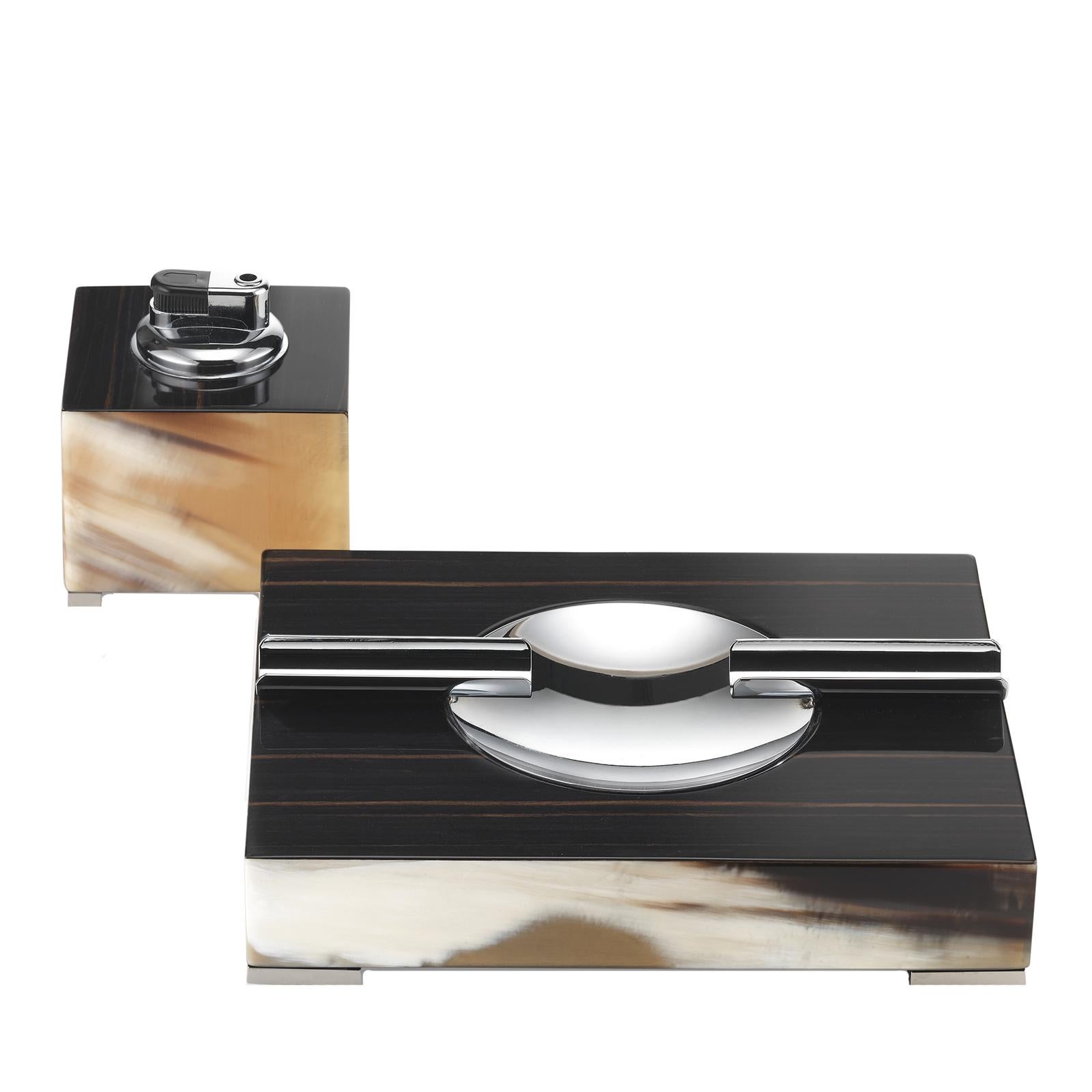 A dramatic accent to any modern living room decor, this square lighter and ash tray set will elevate any coffee table or desk surface with its timeless allure. Modern-inspired with a touch of vintage flair, this set boasts a striking combination of