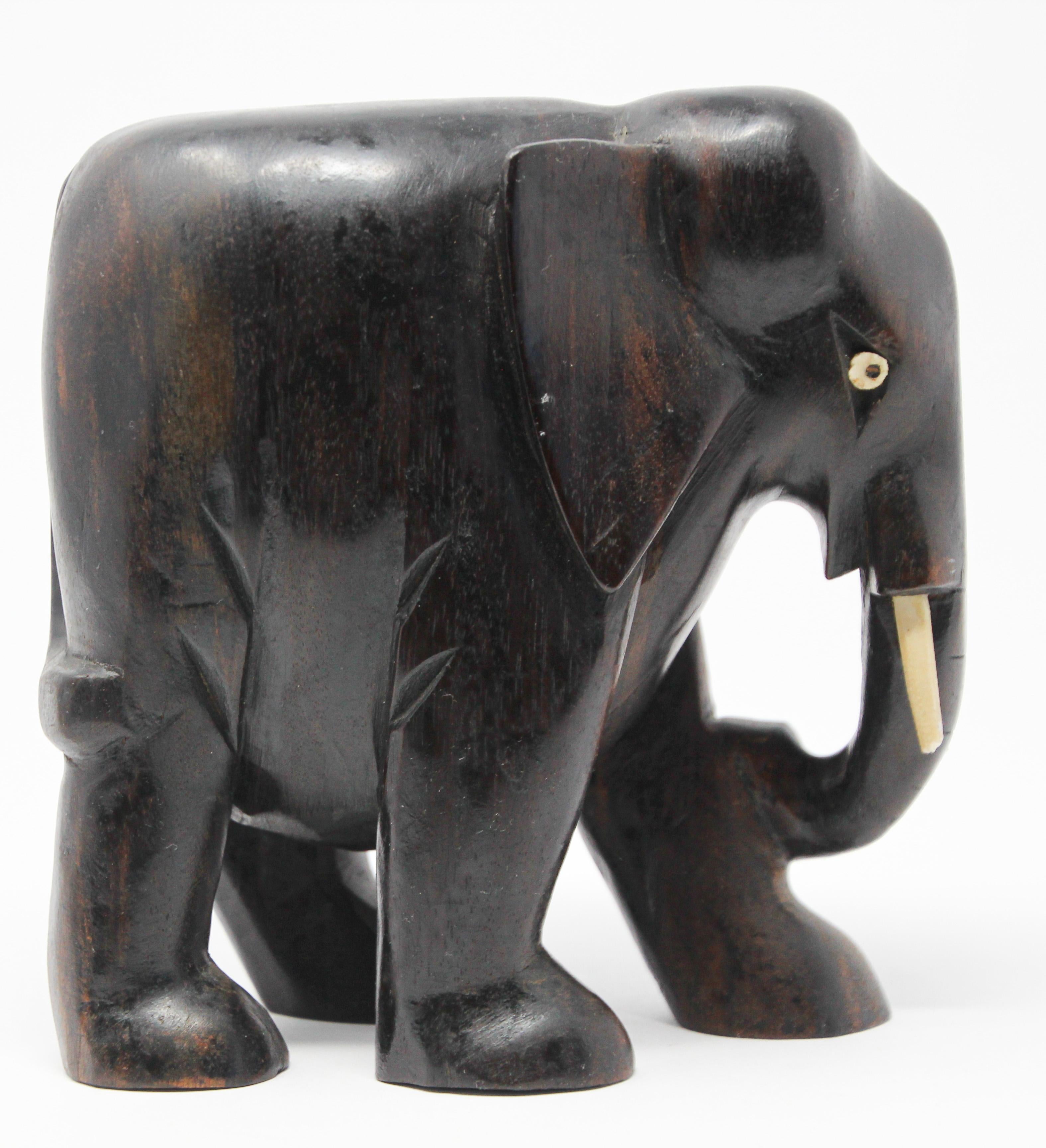 Folk Art Ebony Wood Hand Carved African Elephant For Sale