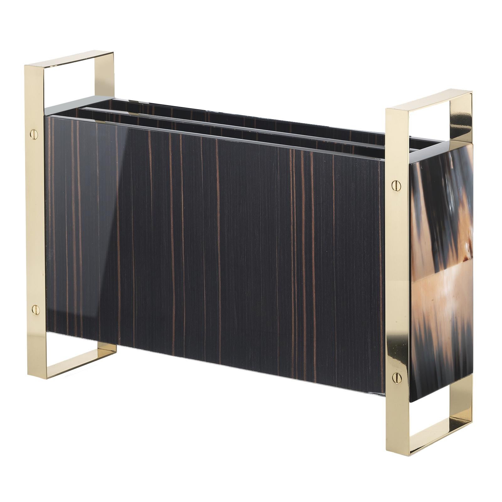 With clear lines and Classic elegance, this magazine holder is an easy way to add a chic accent to any space. The superb design is functional with understated style, bringing together the contrasting dark ebony and the shiny, 24-karat gold-plated