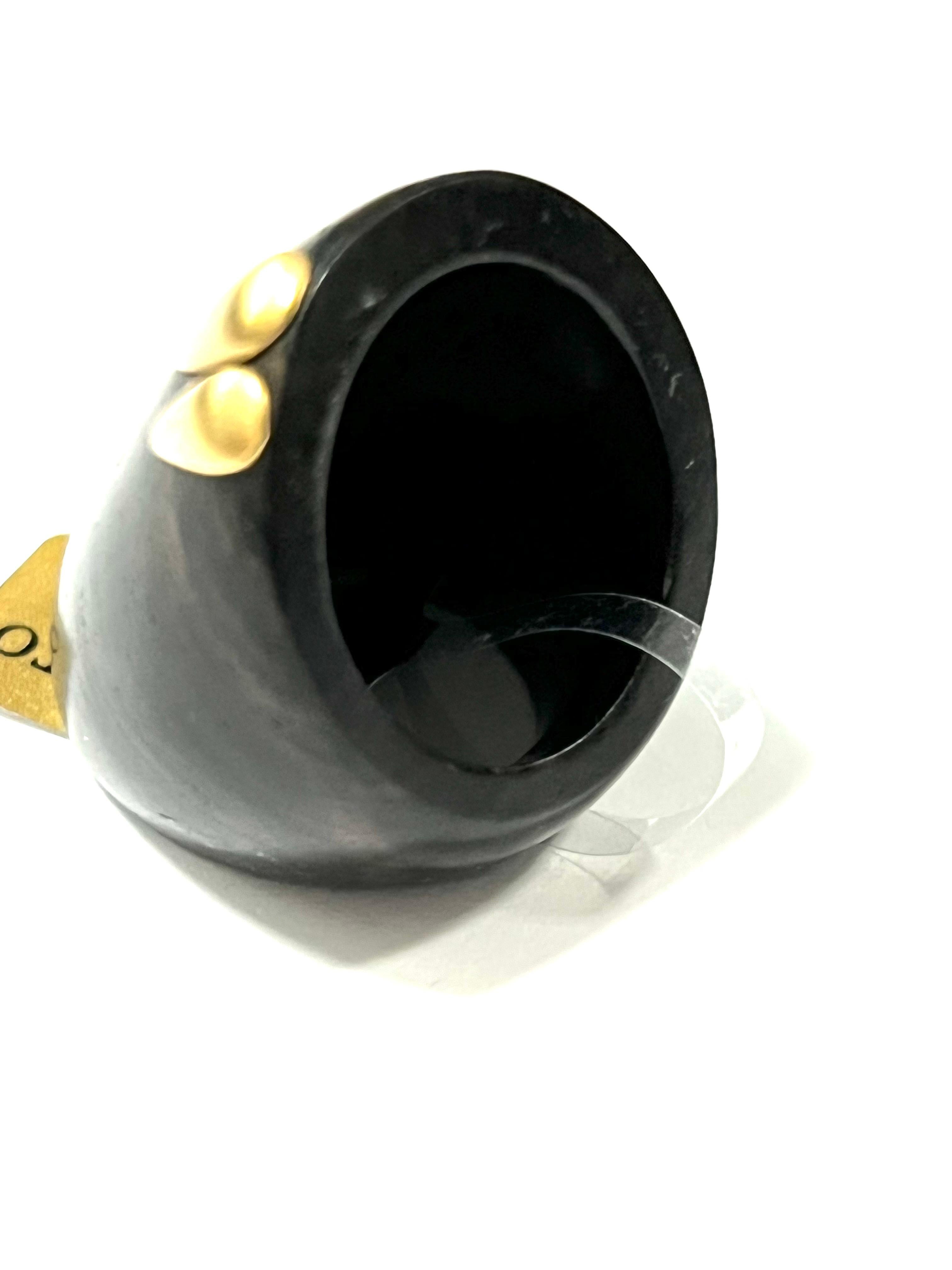 Classic shape for this ebony wood ring with a delicate spot of gold 
Ebony wood is the most elegant and even the most precious
The total weight of the gold is gr 1.00

Stamp 10MI ITALY 750


