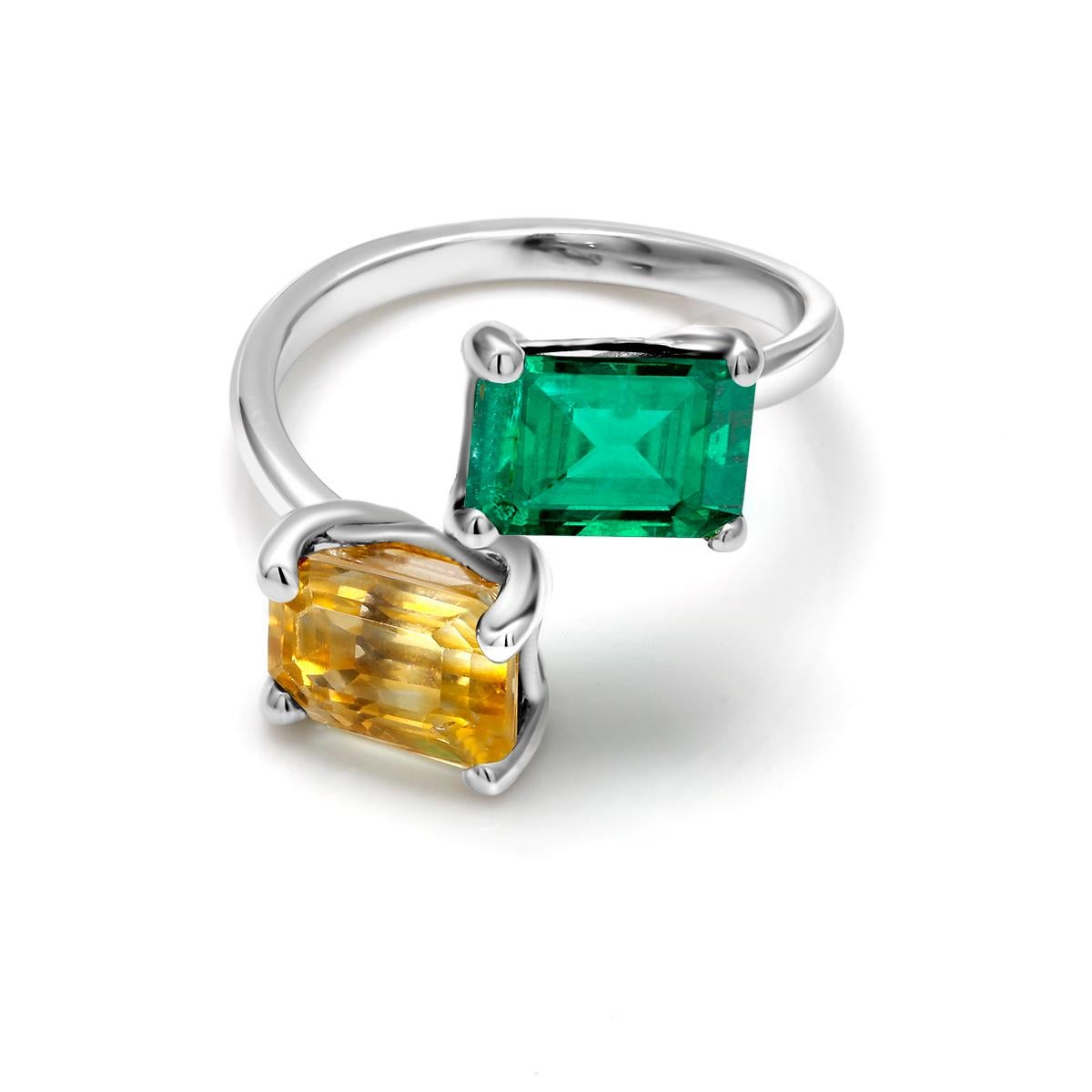 18 karat two tone white and yellow Open shank cocktail ring
Emerald cut emerald weighing 1.25 carat  
Emerald cut yellow sapphire weighing 2.86 carat                                                                    
Ring size 6.5 In Stock
Ring can