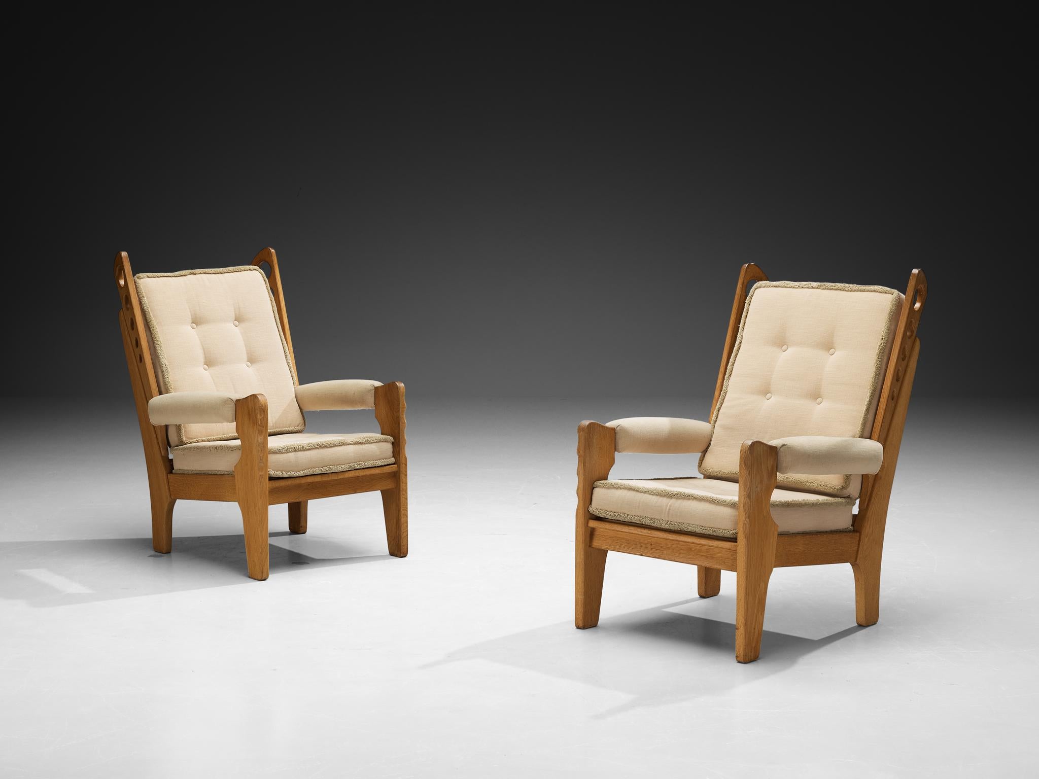 Lounge chairs, solid oak, fabric, Europe, 1960s

This elegant yet eccentric pair of lounge chairs, crafted in Europe during the 1960s, embodies both flair and comfort. Their distinctive design showcases a unique and sculptural silhouette, giving