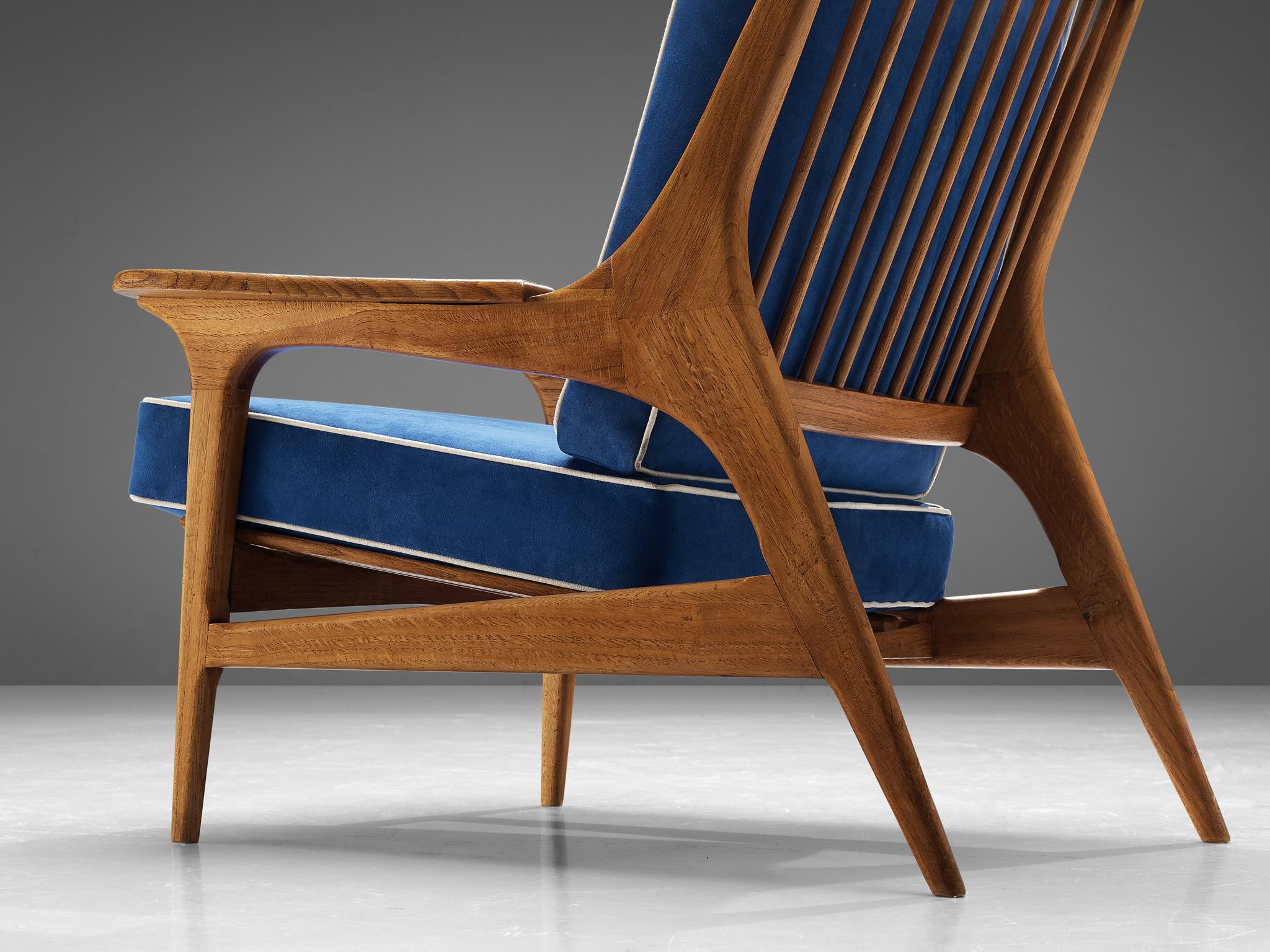 Mid-20th Century Eccentric Pair of Italian Lounge Chairs in Oak and Blue Upholstery  For Sale
